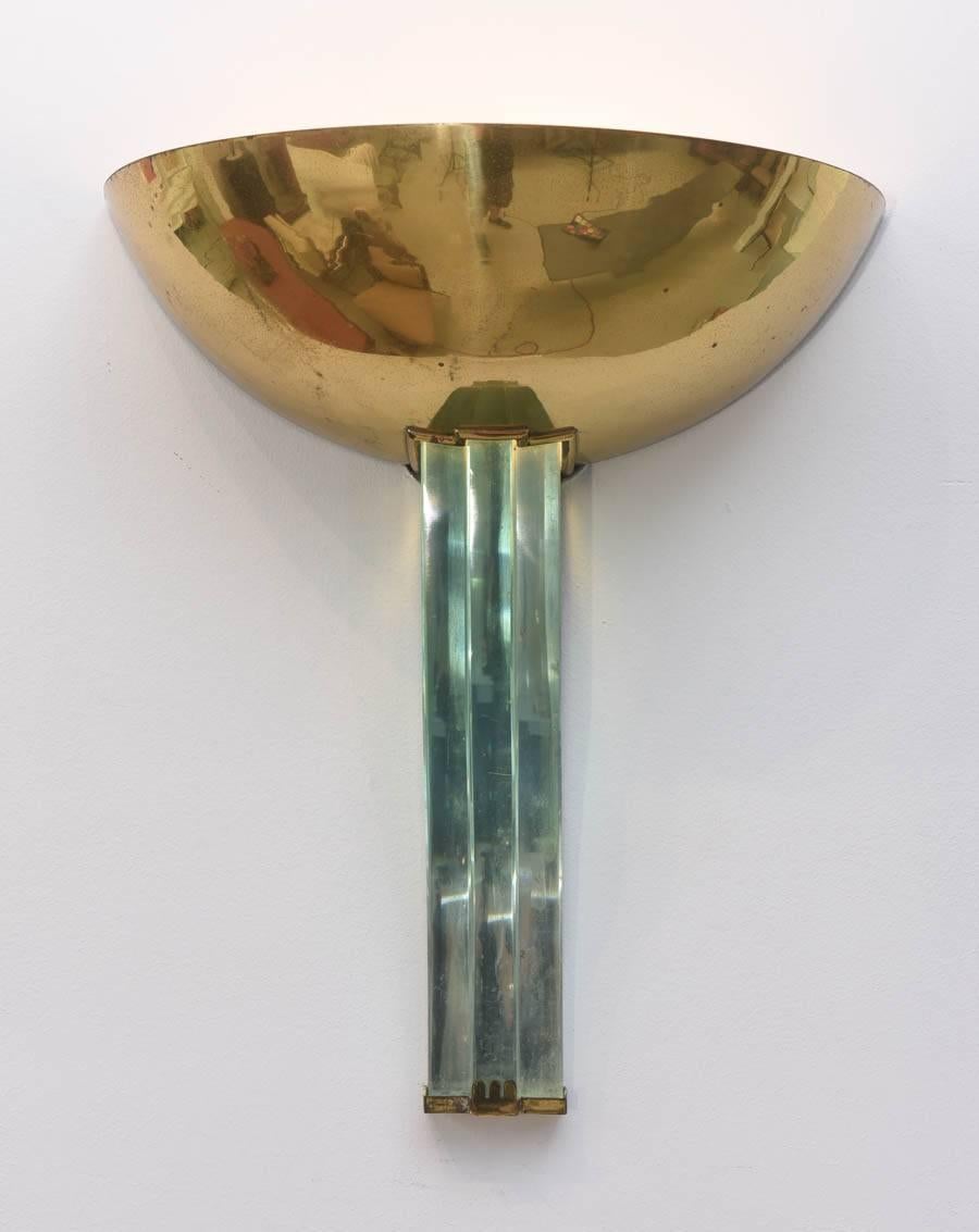 The brass bowl over three separate glass rods with brass connectors, illustrated in Fontana Arte.