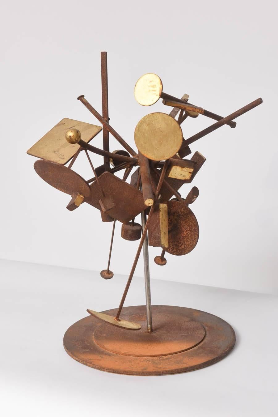 Perfectly and auspiciously whimsical. Iron and gold leaf kinetic sculpture, in abstract form -a tabletop sculpture. The sculpture is in excellent original condition.

In the style of Mathias Goeritz, Elayna Toby Singer, Harry Bertoia, Louise