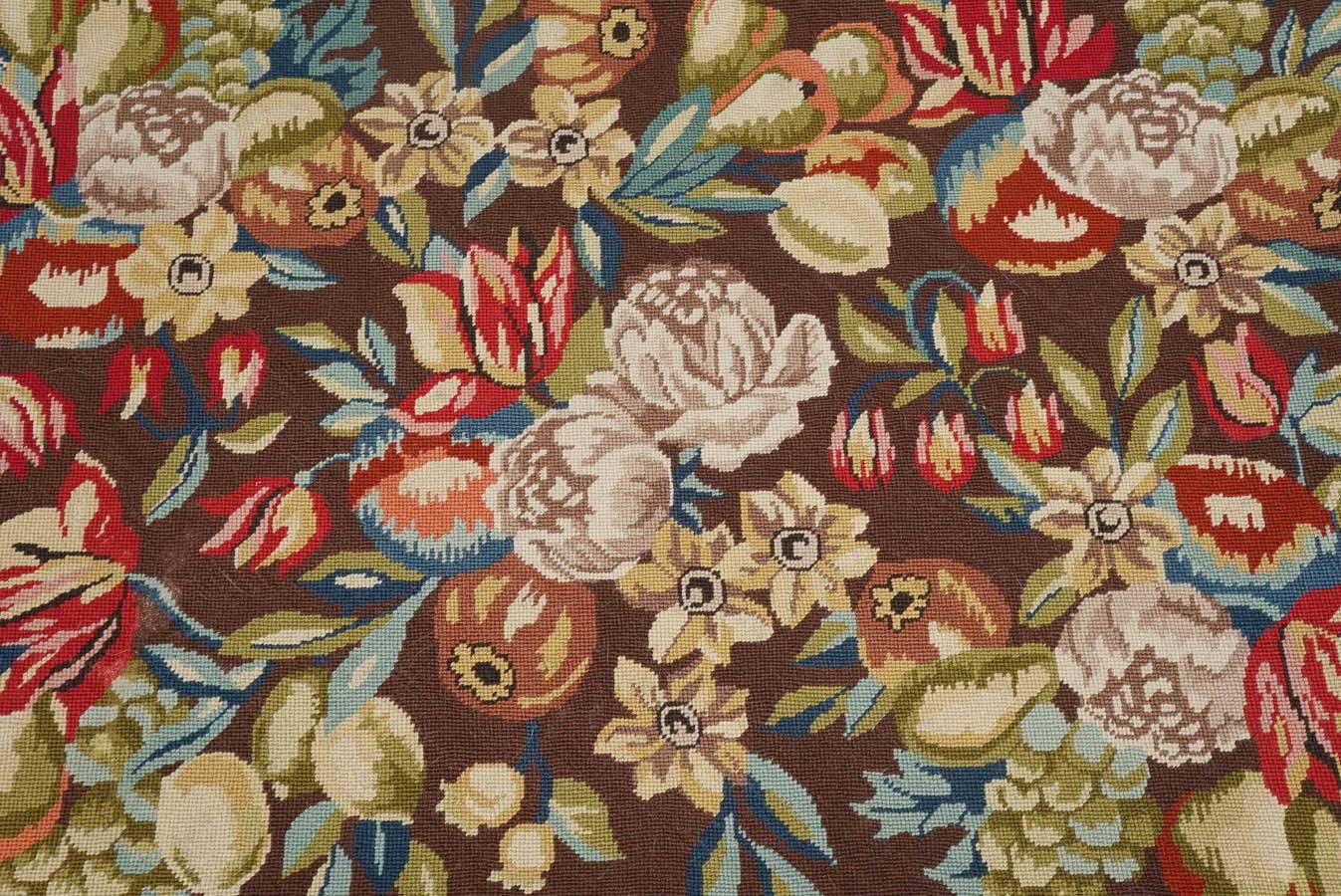 Lovely floral arrangement on this colorful wall hanging. Handmade, lined, and. mounted. Excellent condition and deep, rich colors. 