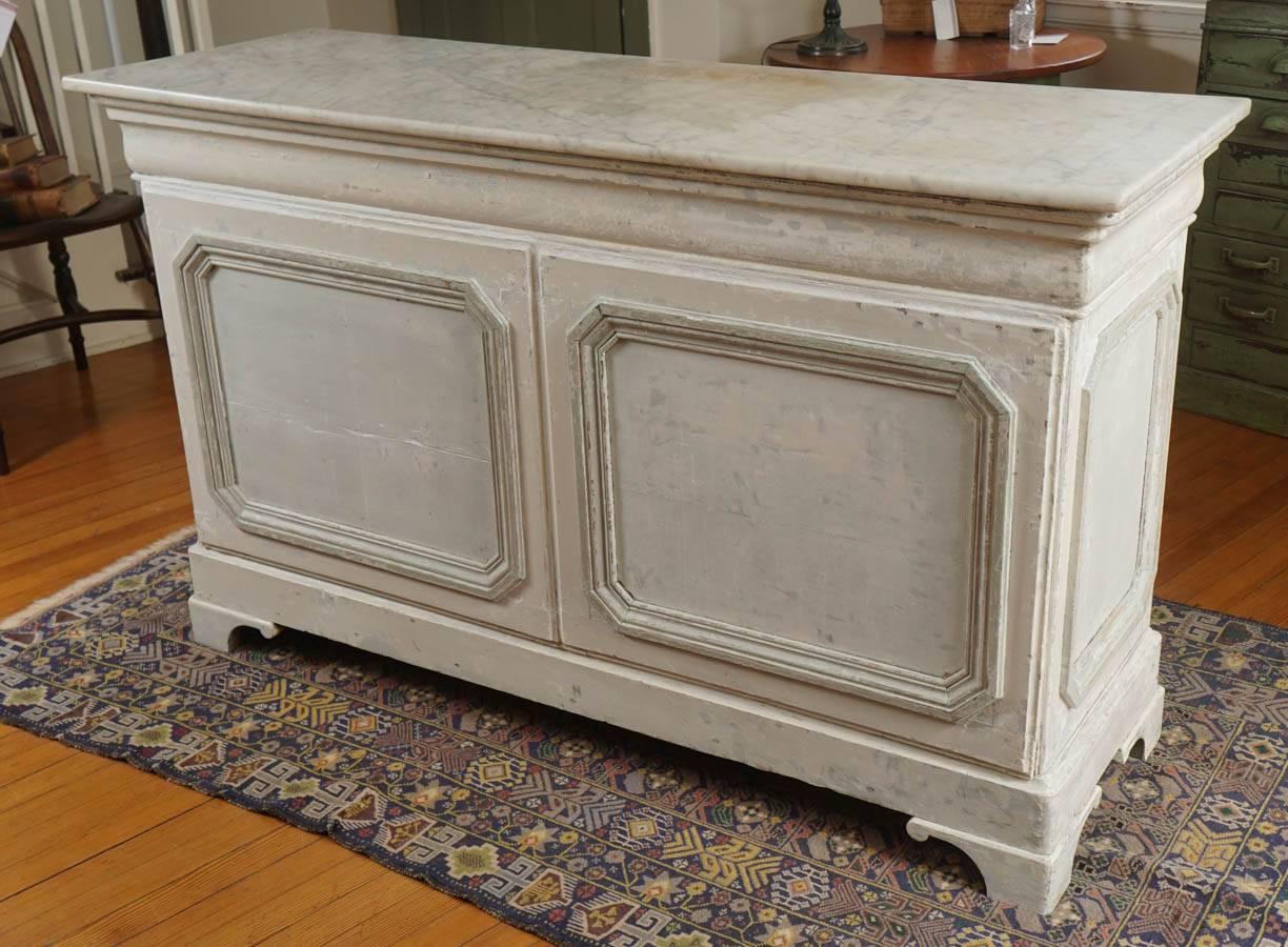 Original, original, original. That describes the marble, paint and hardware on the other side. This store counter was from a French bakery and the other side has one drawer and one original shelf. How perfect would this be as the center island in