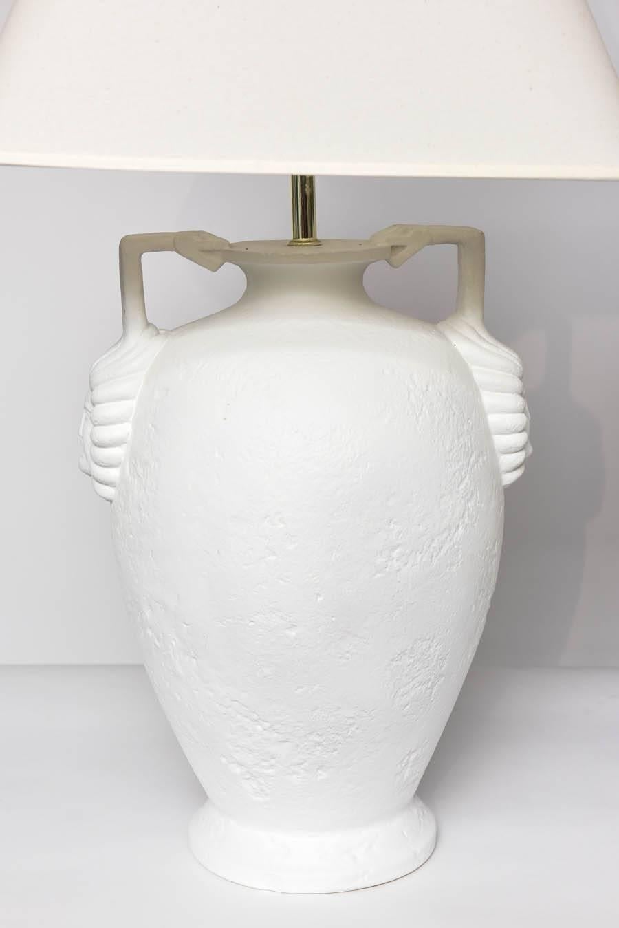 Wonderful texture and details for these plastered urn style Egyptian Revival lamps. Shades shown are NOT included. Please look at detail pictures to better admire the beauty of these lamps.