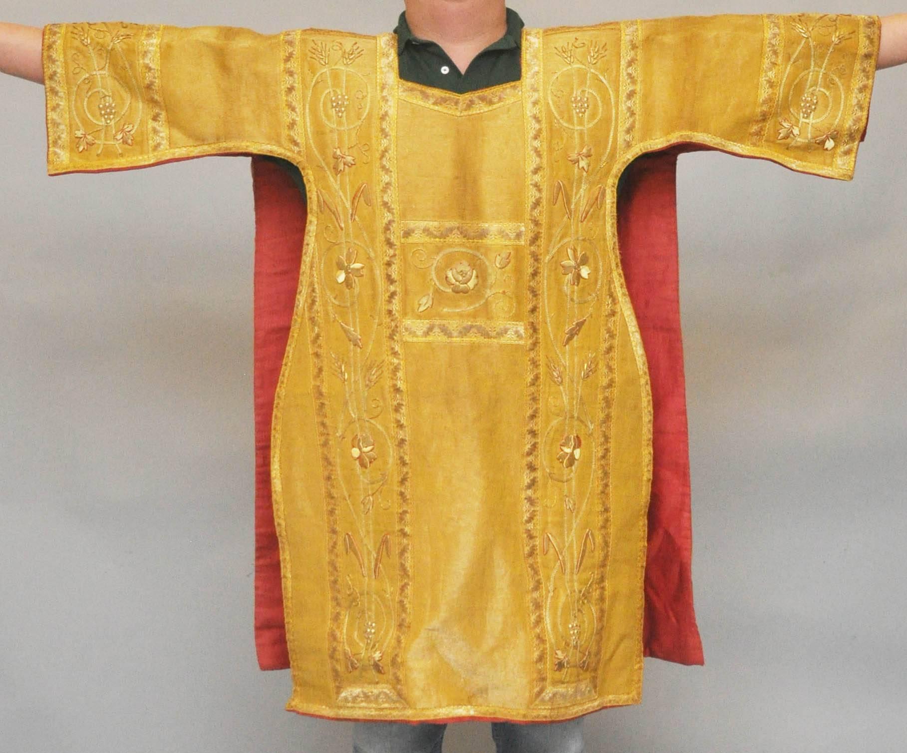 19th century gold silk vestment, religious garment which would of been blessed by the church. Trailing ecclesiastical silk and gold thread embroidery with Australian wild flower motif and Christian symbols wheat (loaves) and grapes (wine). The