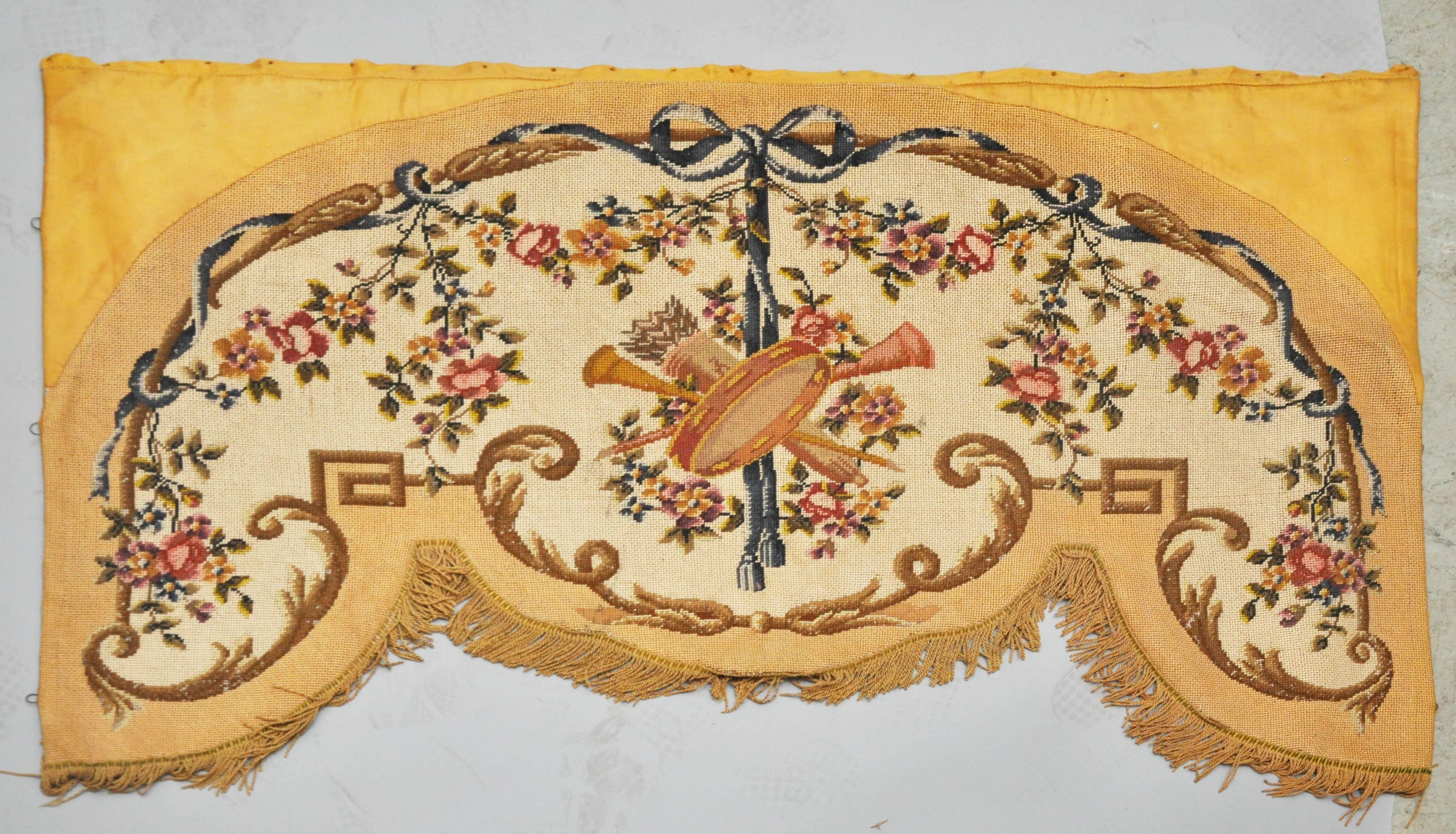 French Louis XVI Savonnière Lambrequin needlepoint panels. Four identical rectangular shapely panels with a gold silk background, gold arched needle point frame within surrounding a creamy field with Louis XVI motifs, scrolls, Greek key, floral,
