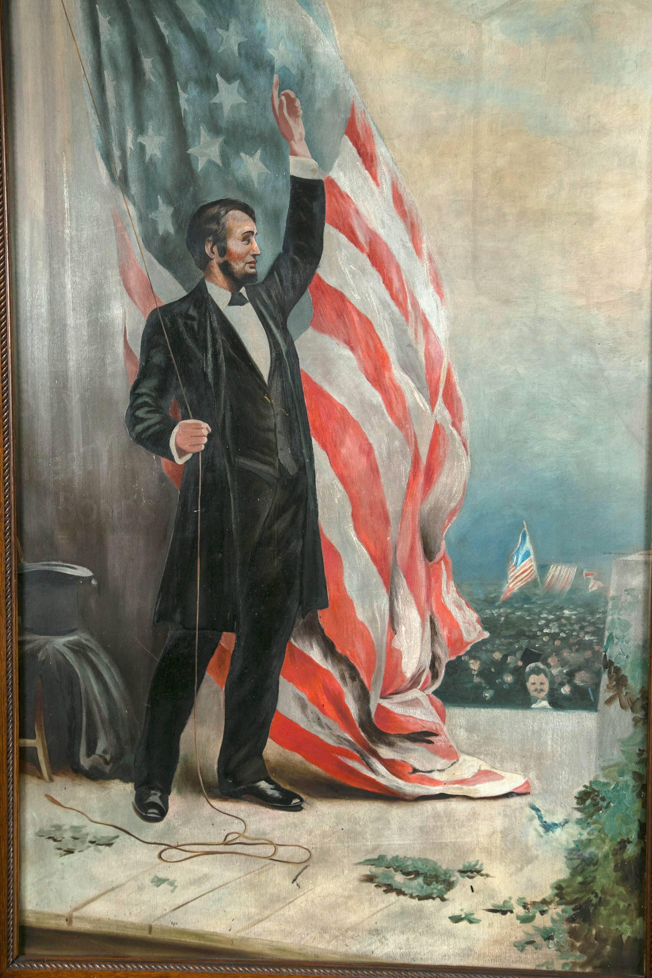 A fabulous custom framed full length portrait of Lincoln with the stars and strips in the background. a perfect statement piece.