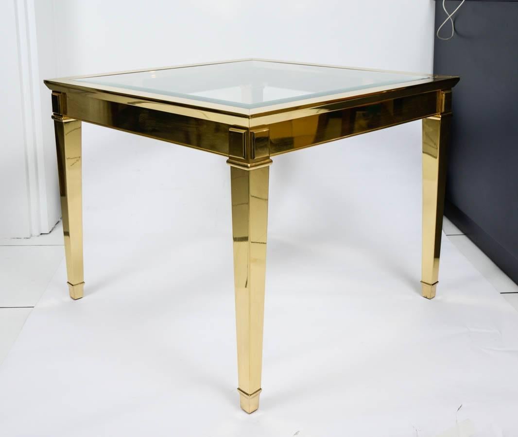 Very chic large end table in bronze, with a polished varnished finish.
circa 1980.