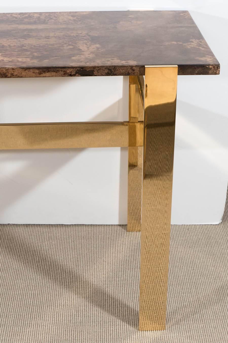 Aldo Tura console table with contemporary mirror polished bronze base.