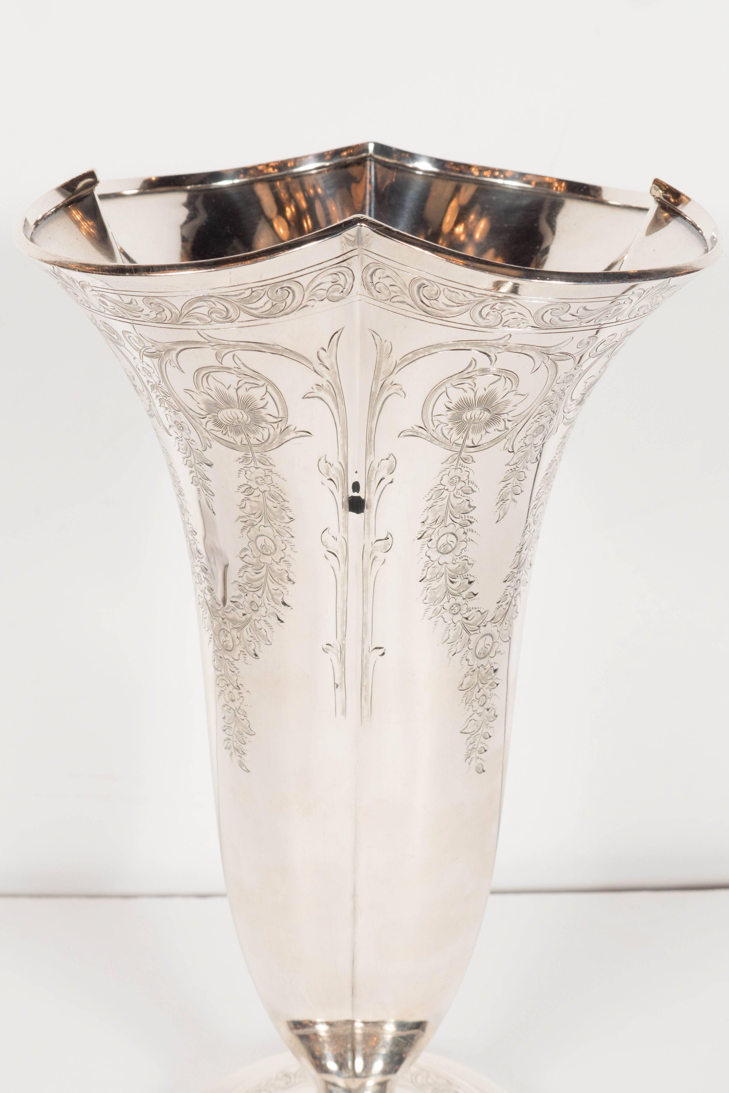 This impressive and hefty trumpet vase was crafted at the turn of the 20th century in sterling silver by Howard and Company. It is a fine example from famed Howard & Co., which was among New York City’s most renowned retail silversmiths’