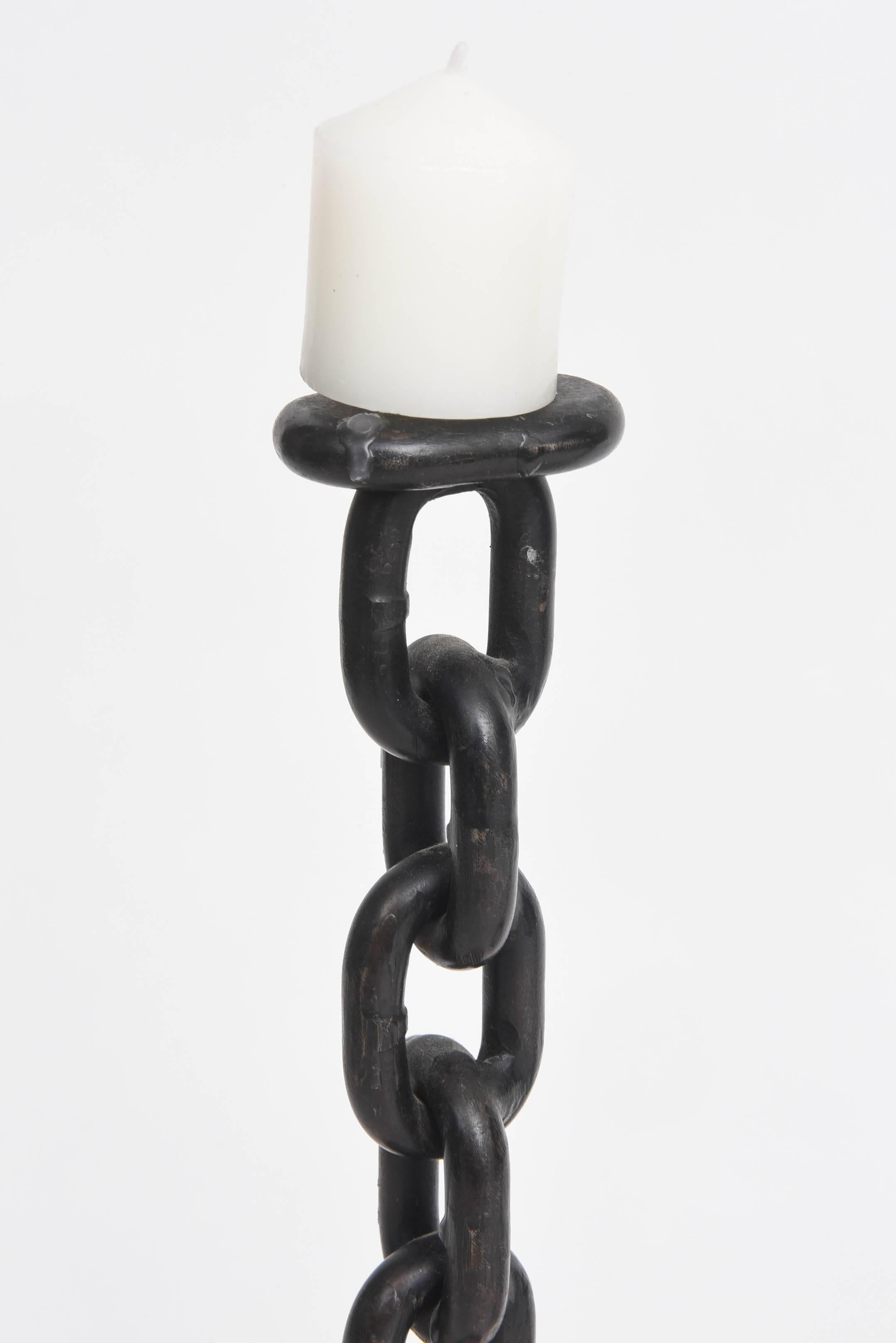 Fanciful iron chain candlesticks, 20th century.