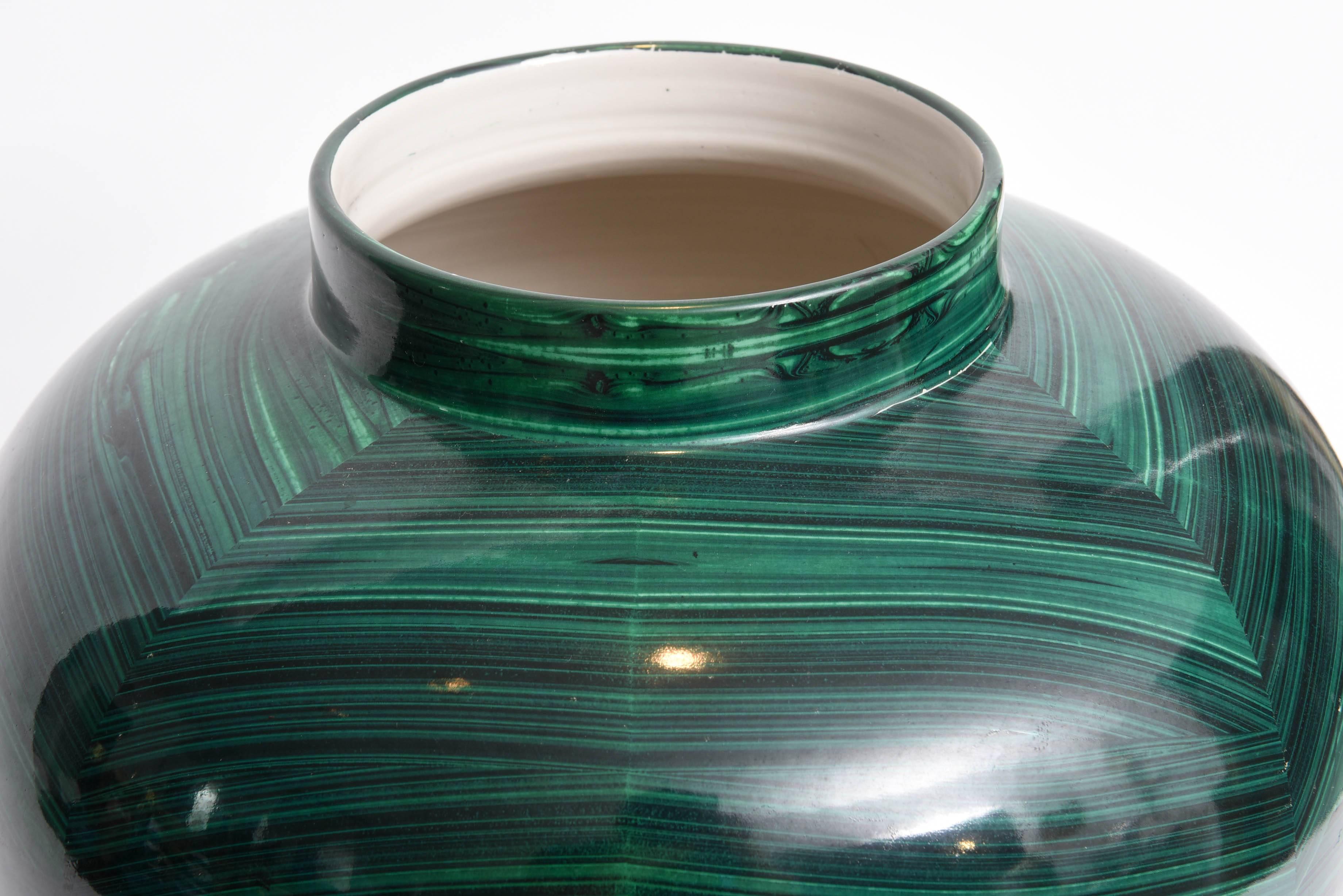 Marked on bottom:   B Ceramiche per Tommaso Barbi  Made in Italy

The vase is designed to suggest the joining of butterflied pieces of malachite.  The overall effect is visually stunning.