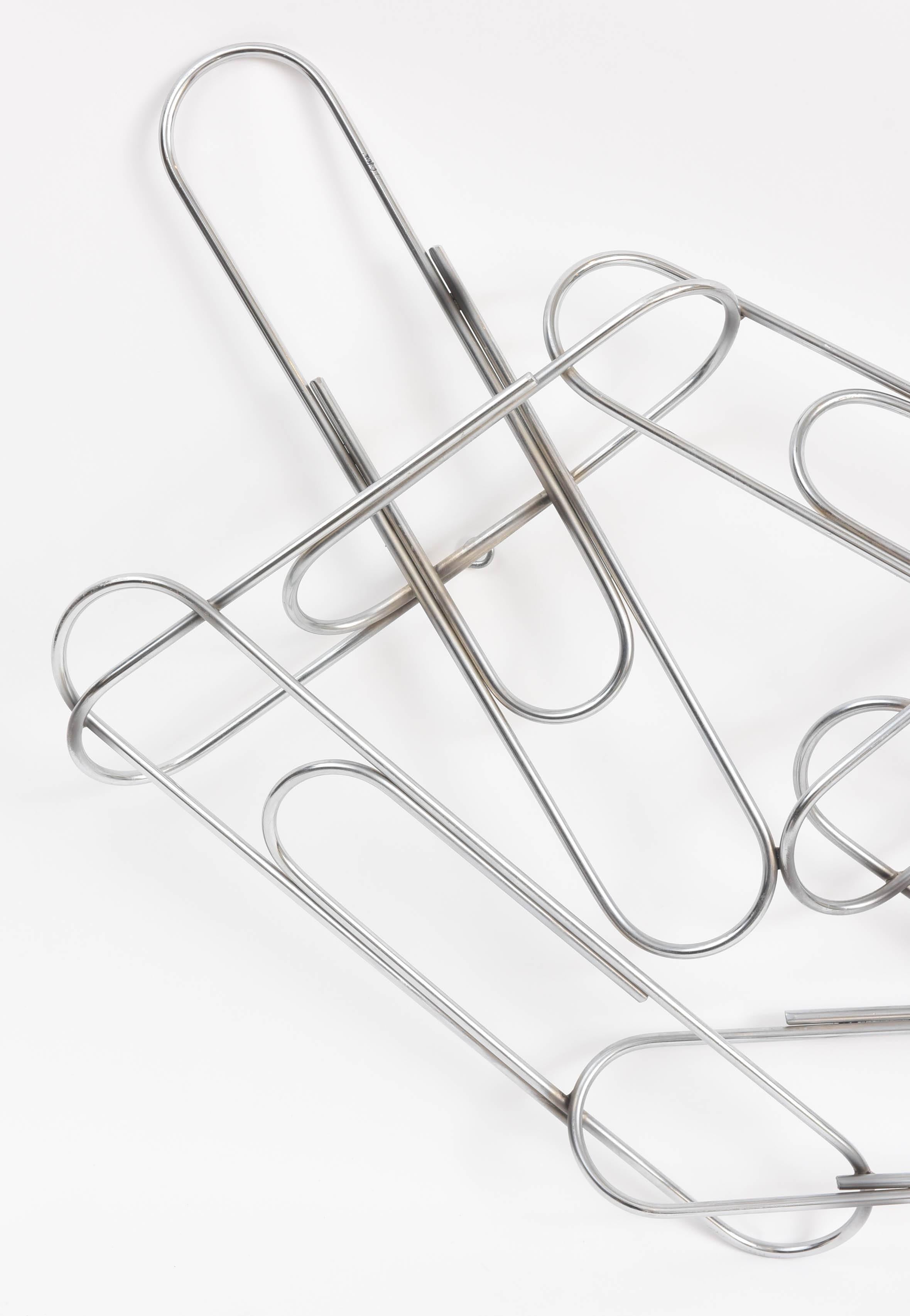 Large signed paper clip wall sculpture by C. Jeré.