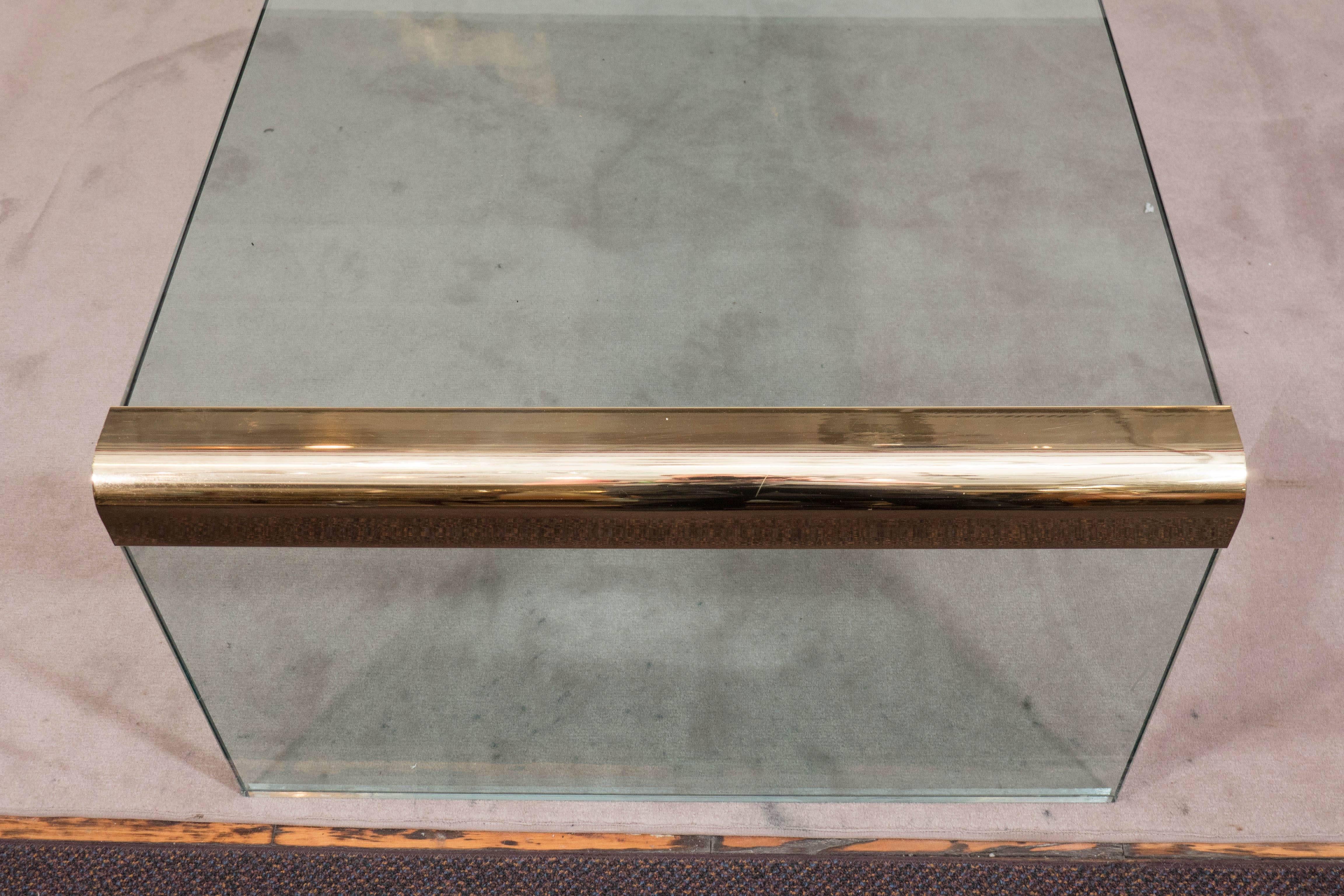 American Pace Collection Glass Waterfall Coffee Table with Brass Trim