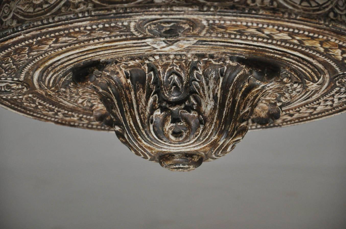 19th century French heavily carved flush mount ceiling plate. Acanthus leaves central decoration surmounted with circular oval flower heads entwined,  egg and dart design at outer rim.