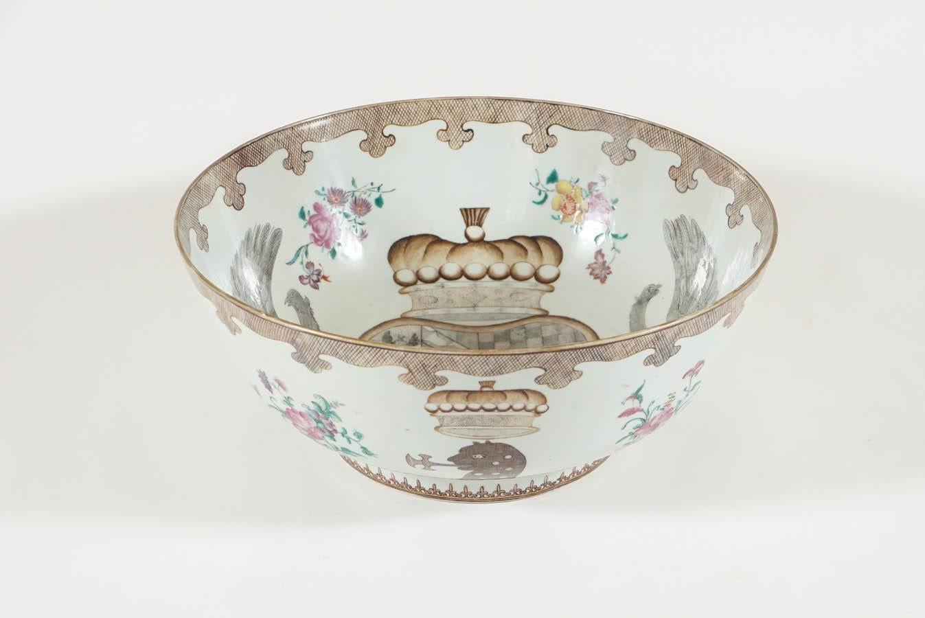 An exquisite and rare circa 1750 Chinese Export porcelain punch bowl of massive size decorated with the coat-of-arms, crest, and motto of William Pleydell-Bouverie, 1st Earl of Radnor, England.  The interior with floral decoration and coat of arms