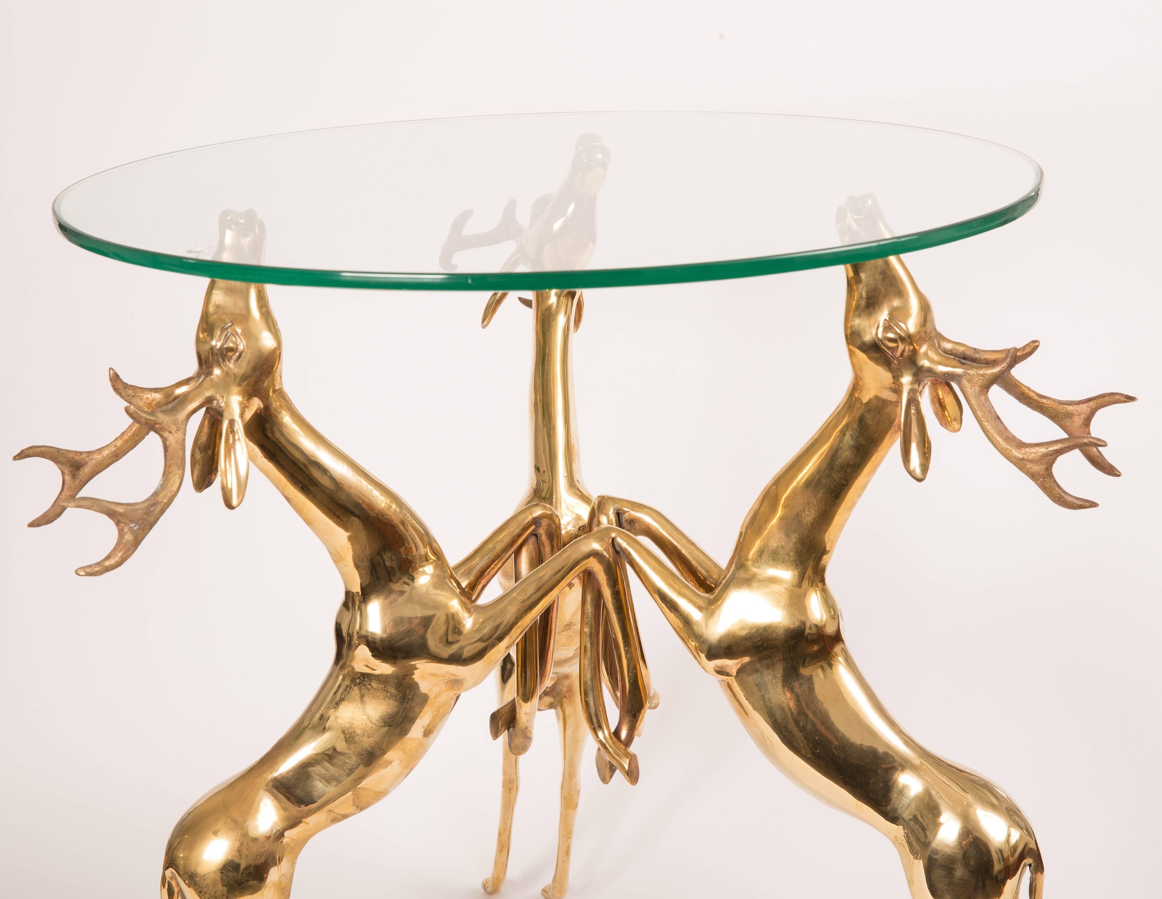 Pair of Glass Top Side Table Featuring Brass Base Composed of a Trio of Rearing Deer