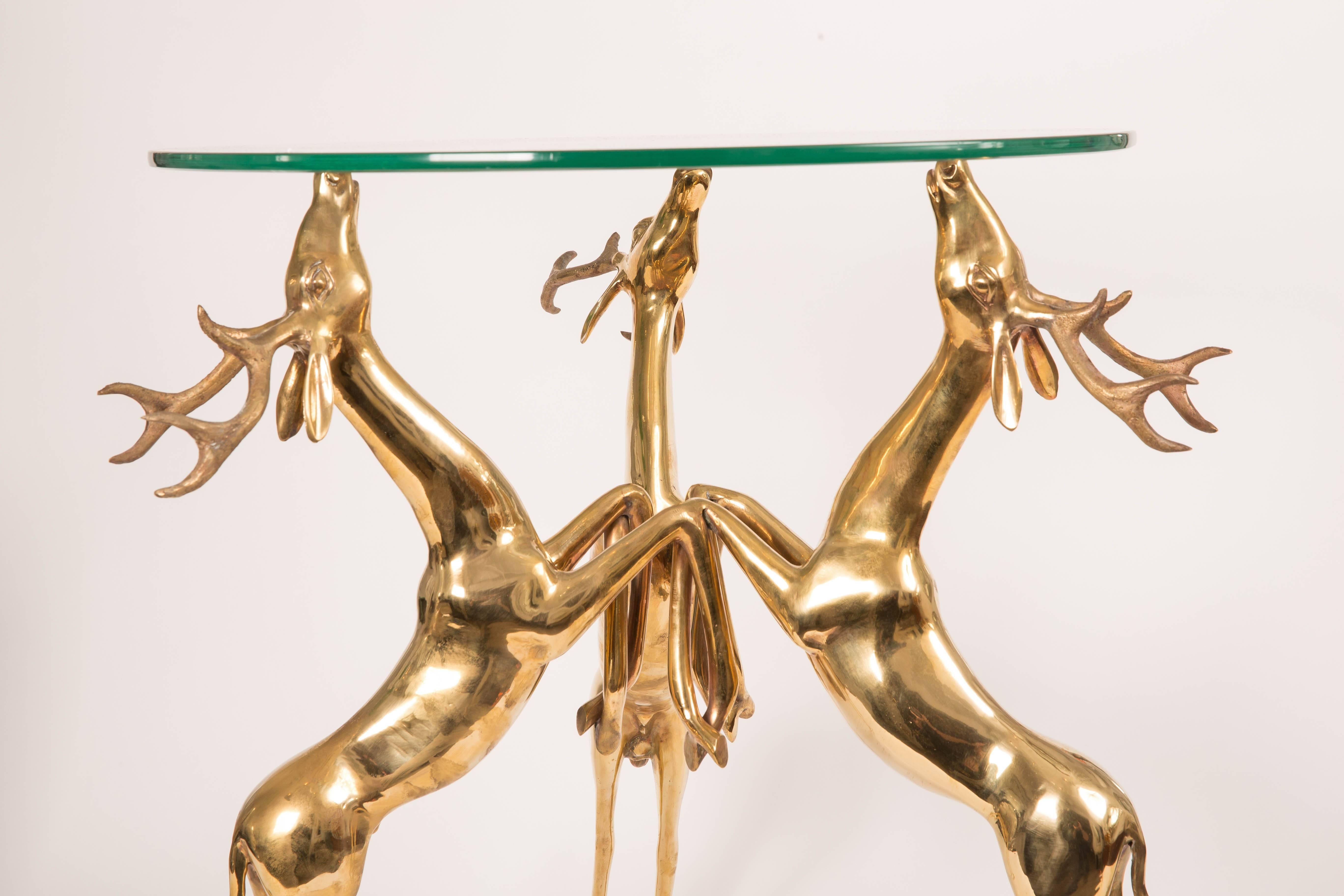 Italian Pair of Glass Top Side Tables Featuring Brass Base Composed of Rearing Deer