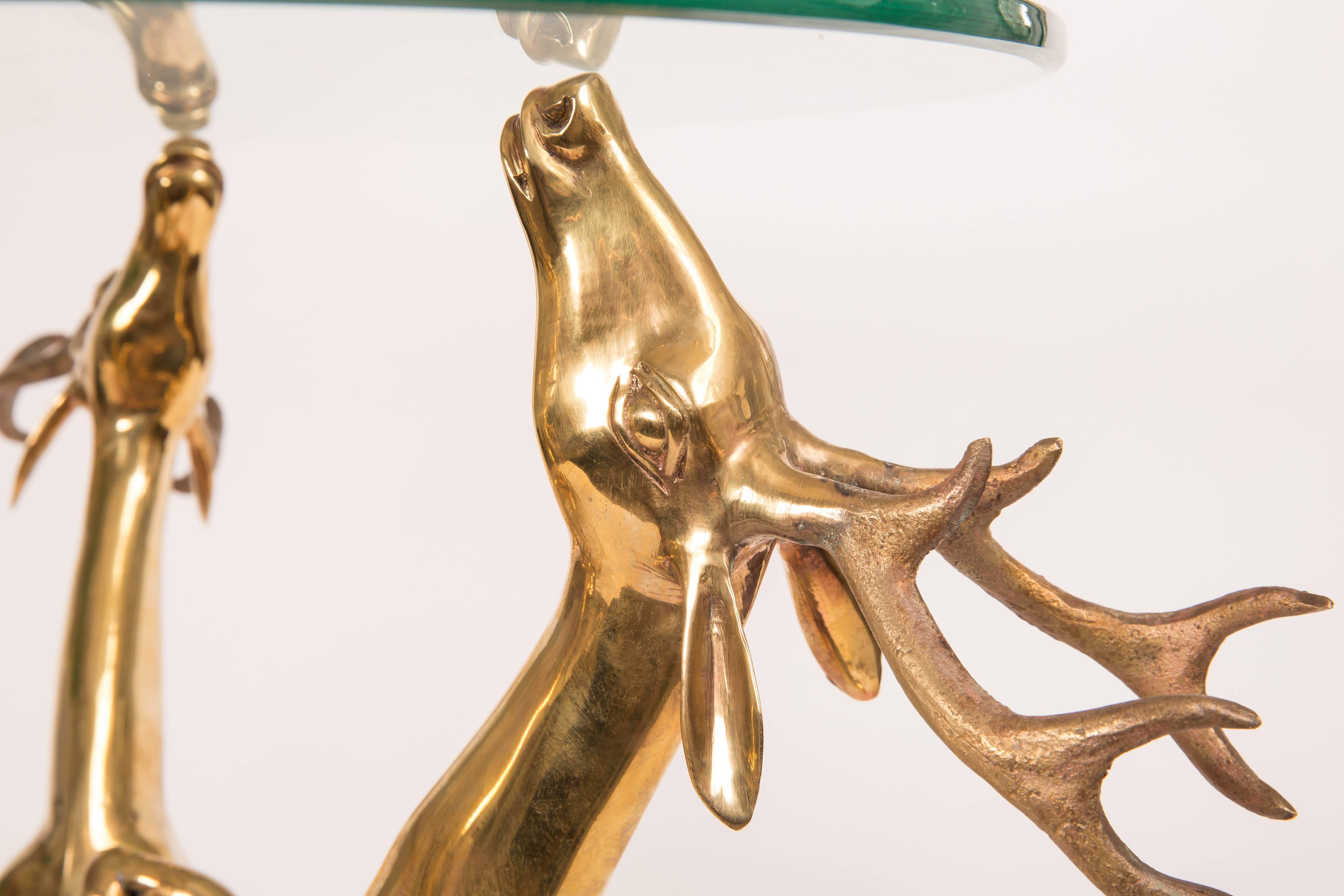 Pair of Glass Top Side Tables Featuring Brass Base Composed of Rearing Deer In Excellent Condition In Bridgehampton, NY