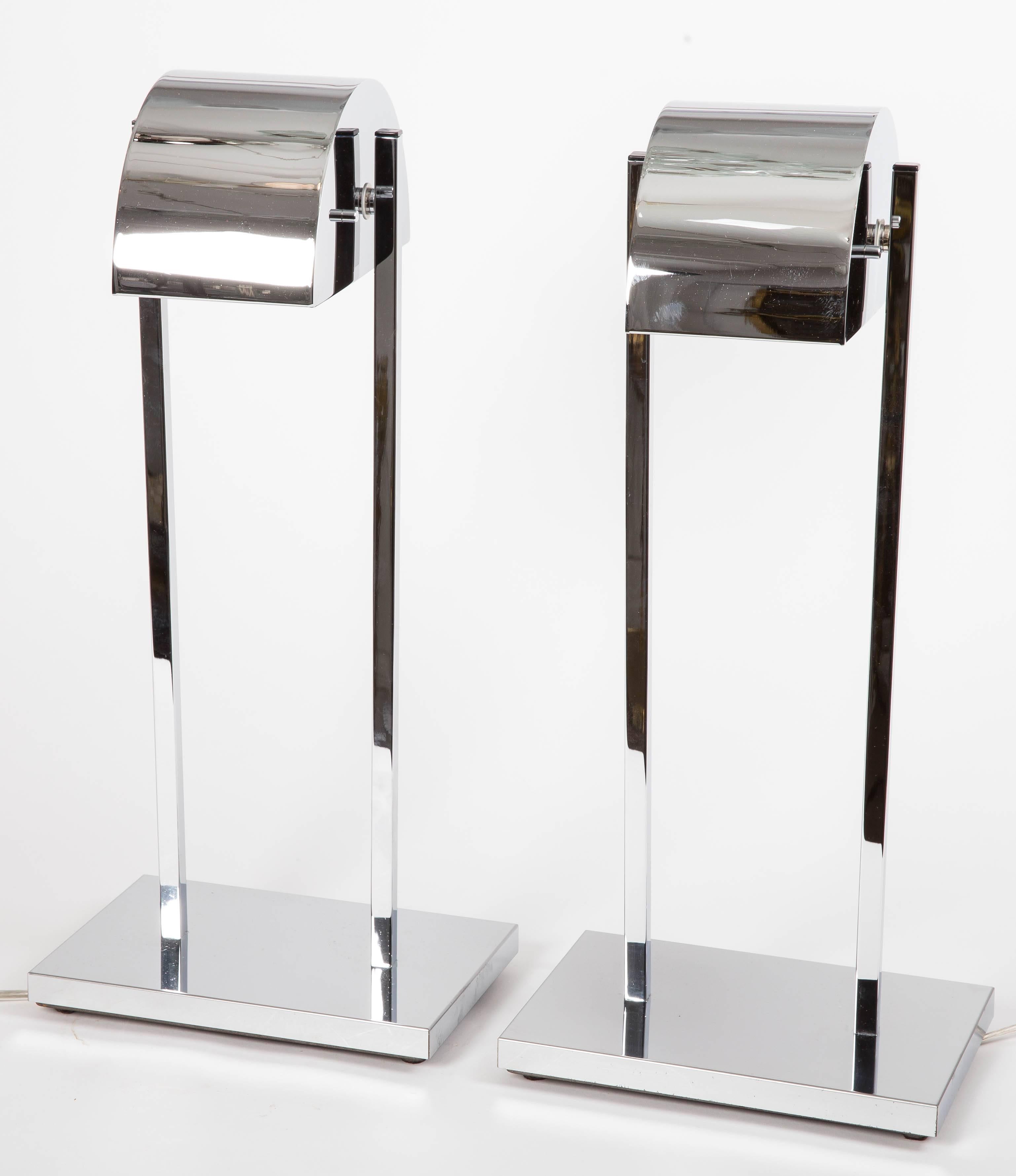 Pair of chrome table lamps with rotating canopy and dimmer by Kovacs.
