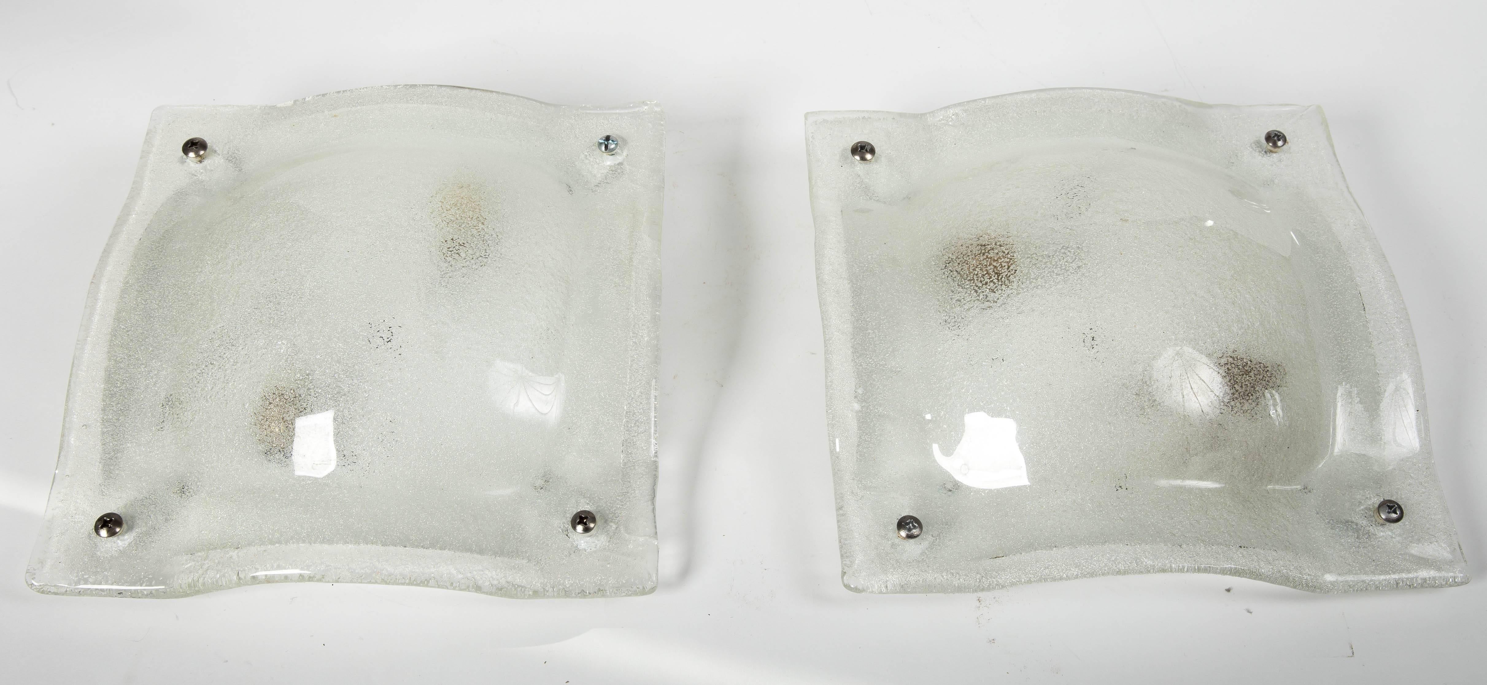 Pair of clear and white lattimo glass convex square sconces with inclusive air bubbles by Vistosi
Multiple pairs available.