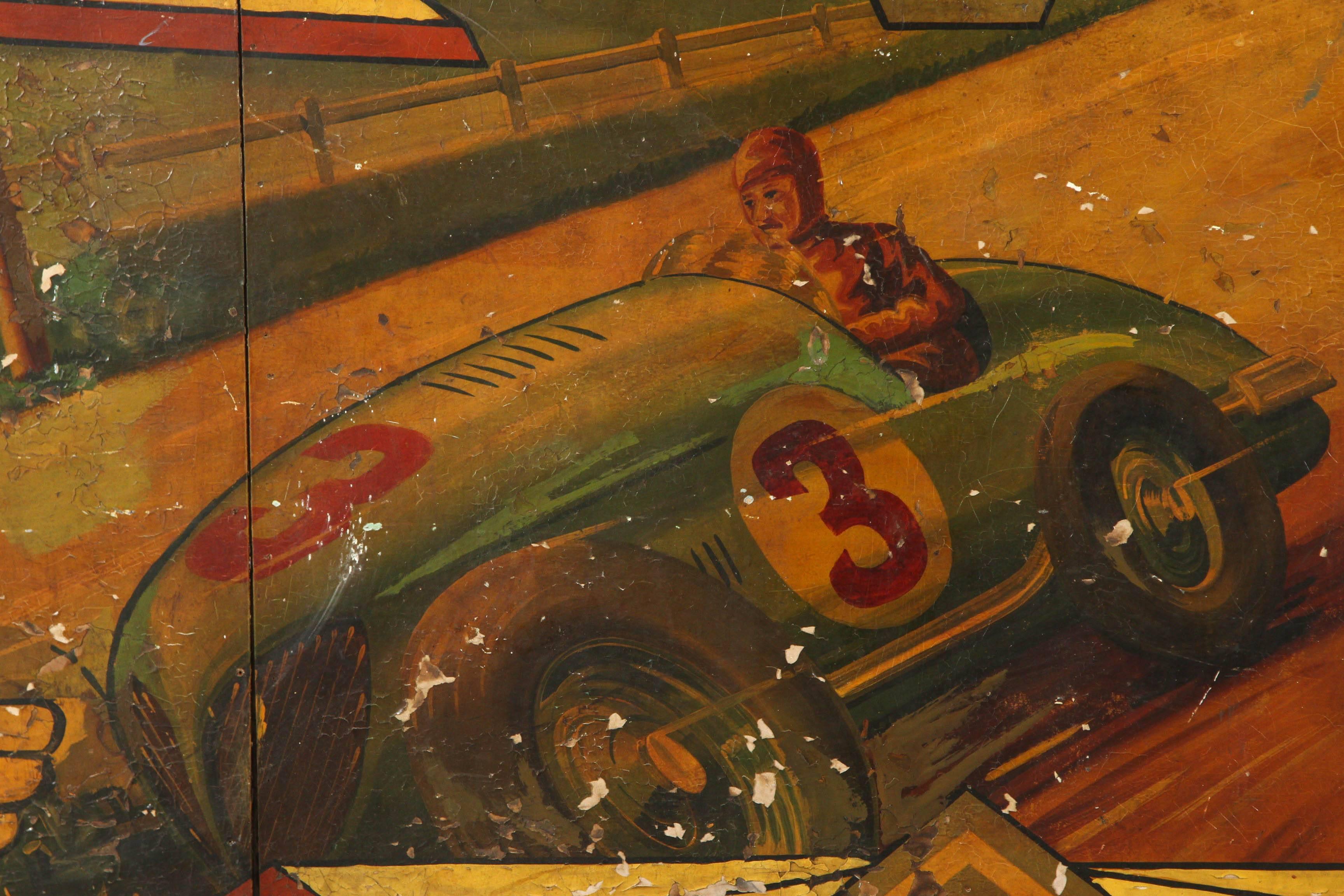 Fantastic early hand-painted carnival rounding board with vintage speedway race cars. Likely made by Spooner in the United Kingdom. This would have been one of a series of panels that would be installed around the upper part of the ride. Please see