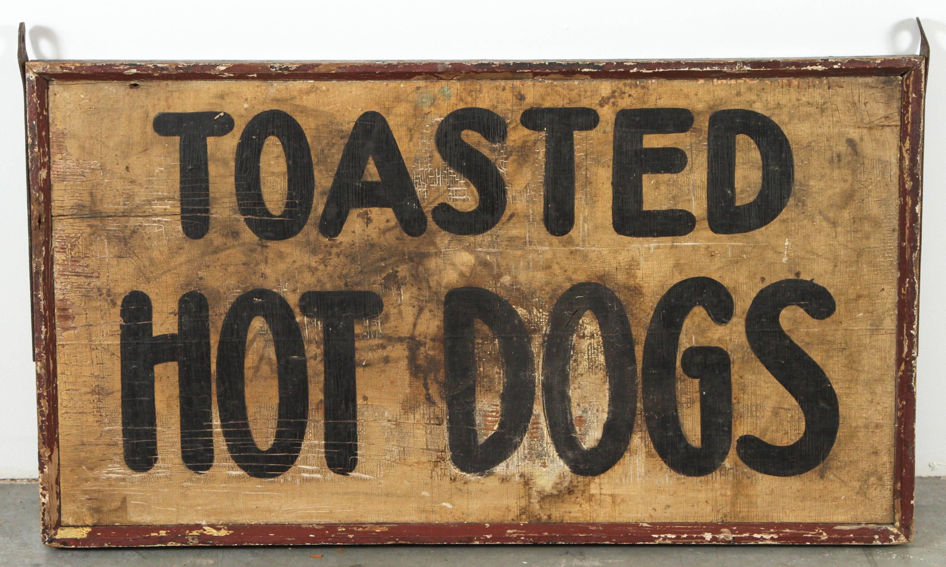 The best subject matter! Late 19th century handpainted American trade sign. Very heavy wood construction with iron strapping. This sign is double sided. One side was exposed to the elements more. Please see close-up images for the fantastic heavily