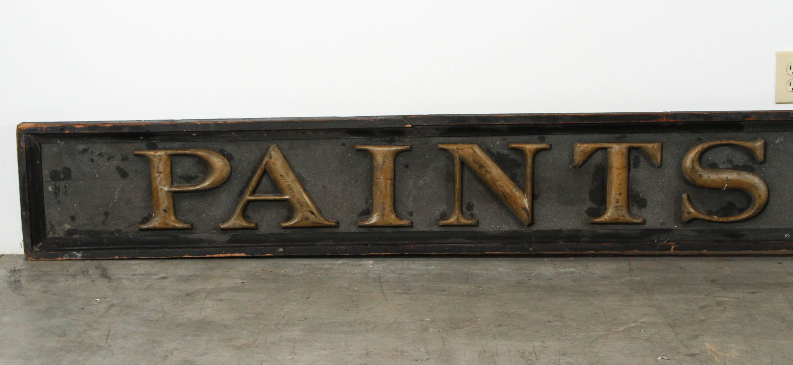 Fantastic three dimensional letters, wood and sand paint. 