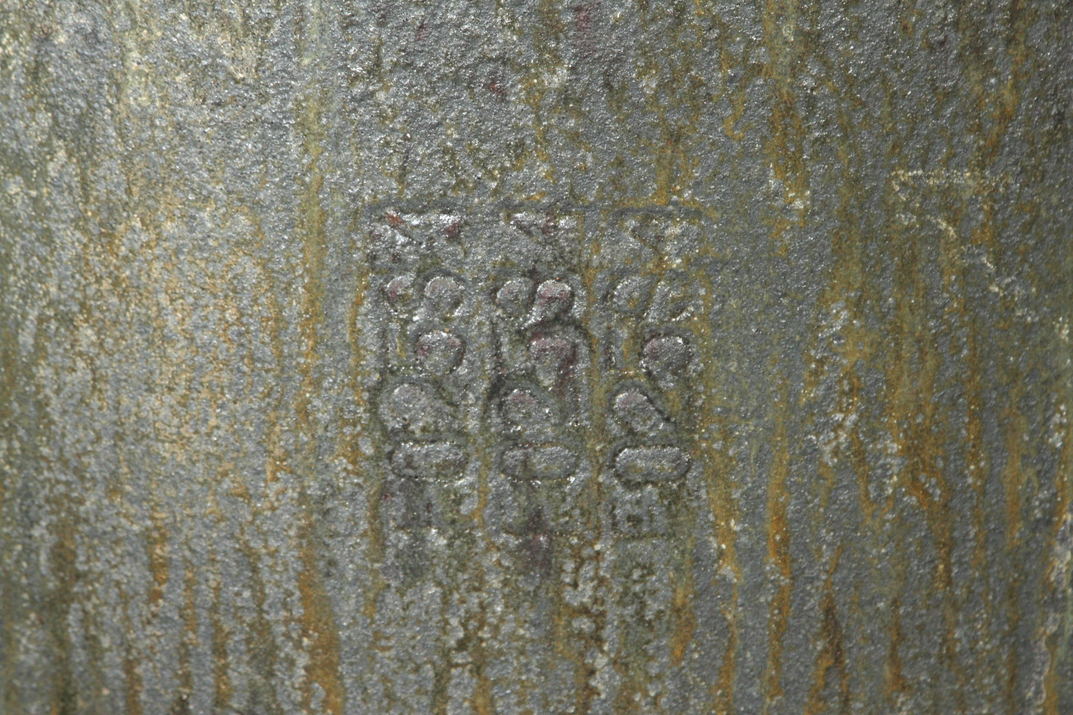 Very large smelting Crucible for bronze or steel foundry. Beautiful green variegated green glaze. Stamped numbers seen in photographs. Substantial enough to use for a potted olive tree. Fantastic courtyard garden planter.