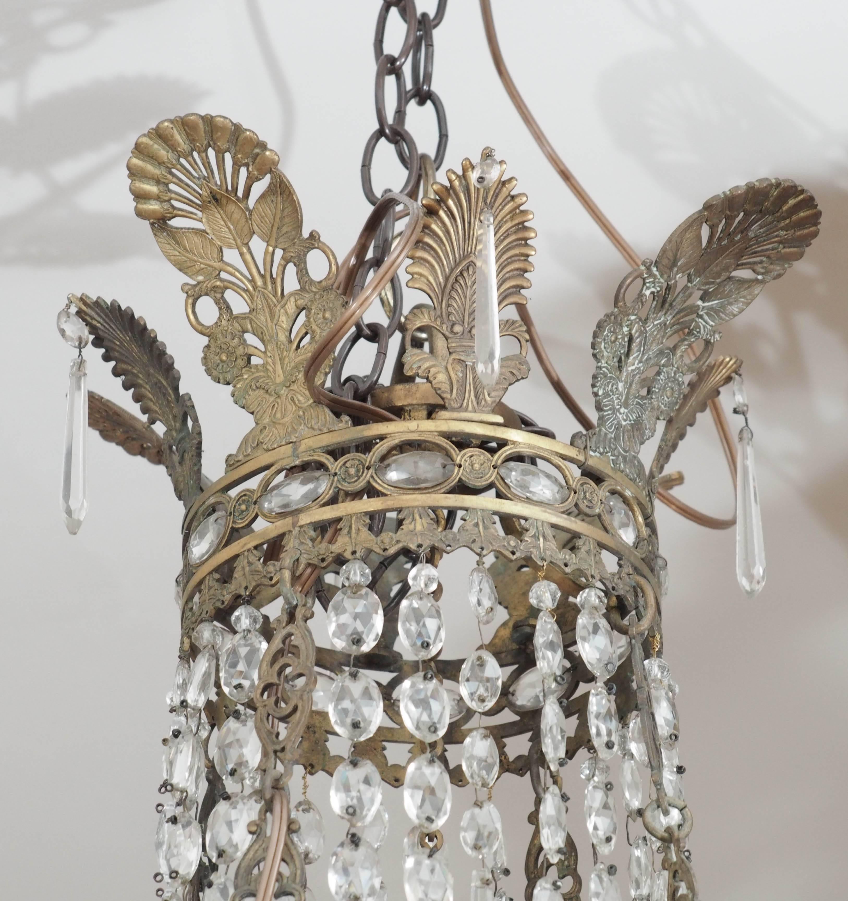 Bronze and crystal Empire period chandelier,
eight lights. US Wired.
 