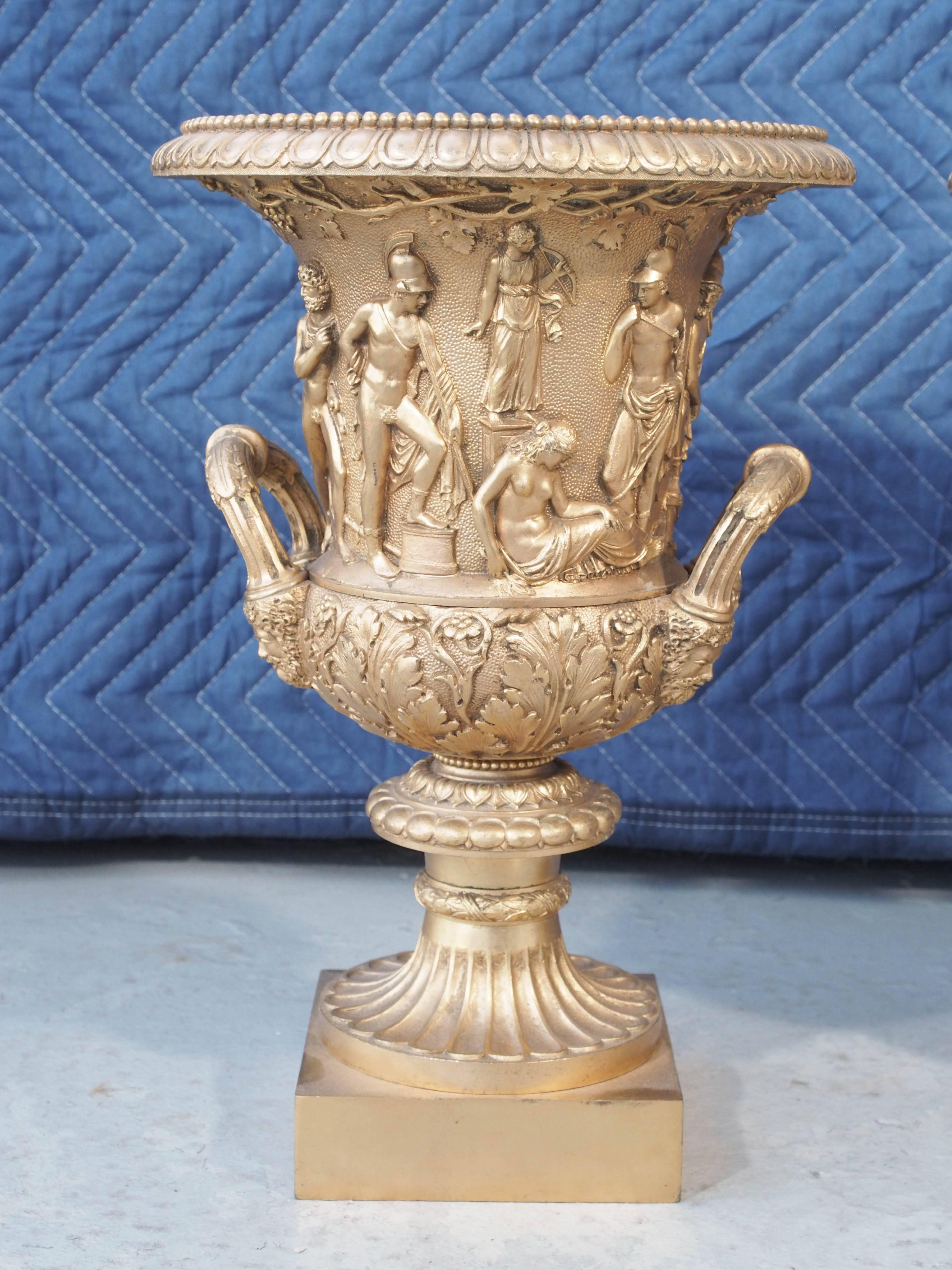 Pair of gilt bronze Grand Tour campagna Borghese urns.