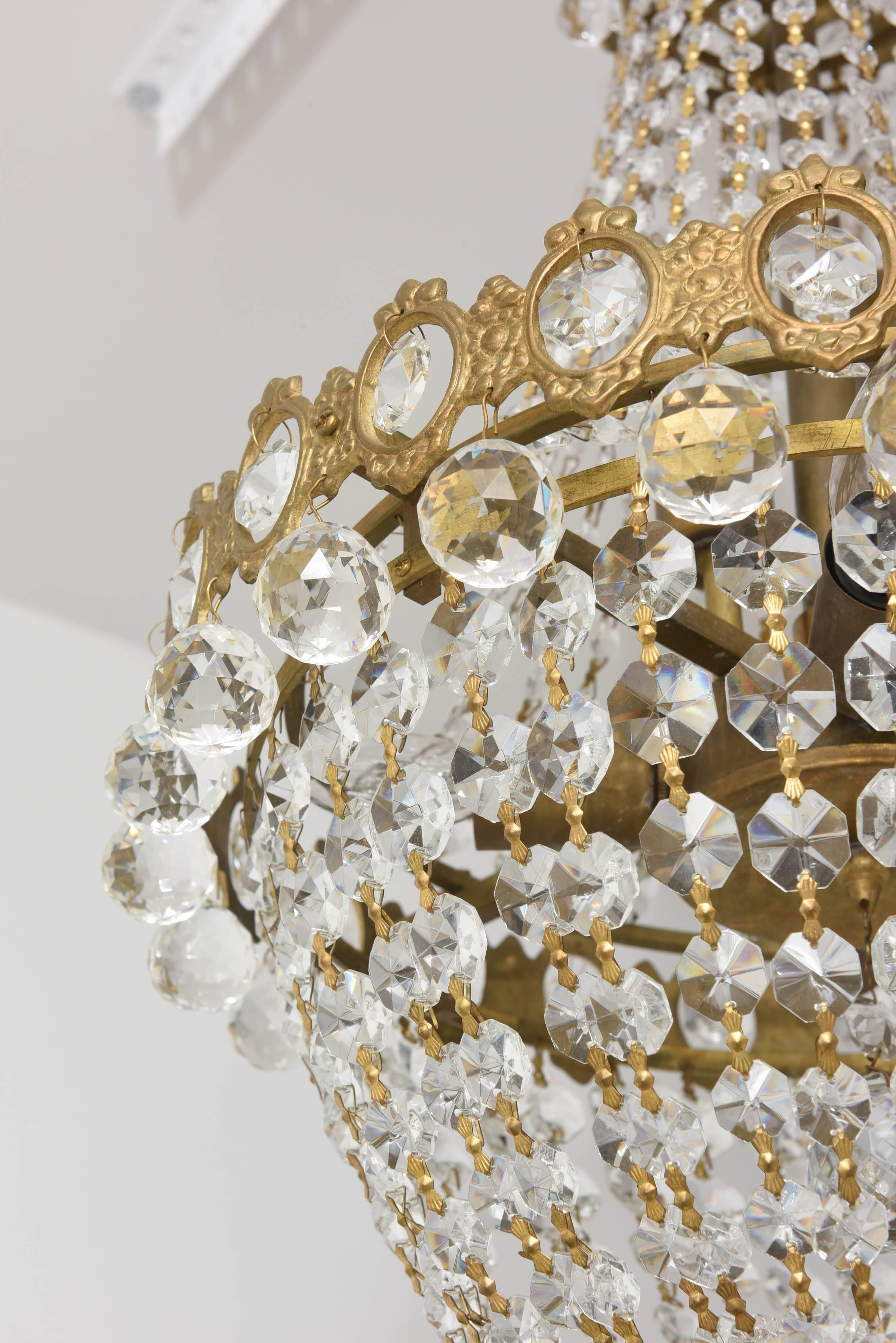Italian Hollywood Regency, Louis XVI Style Chandelier in Antique Brass and Crystals