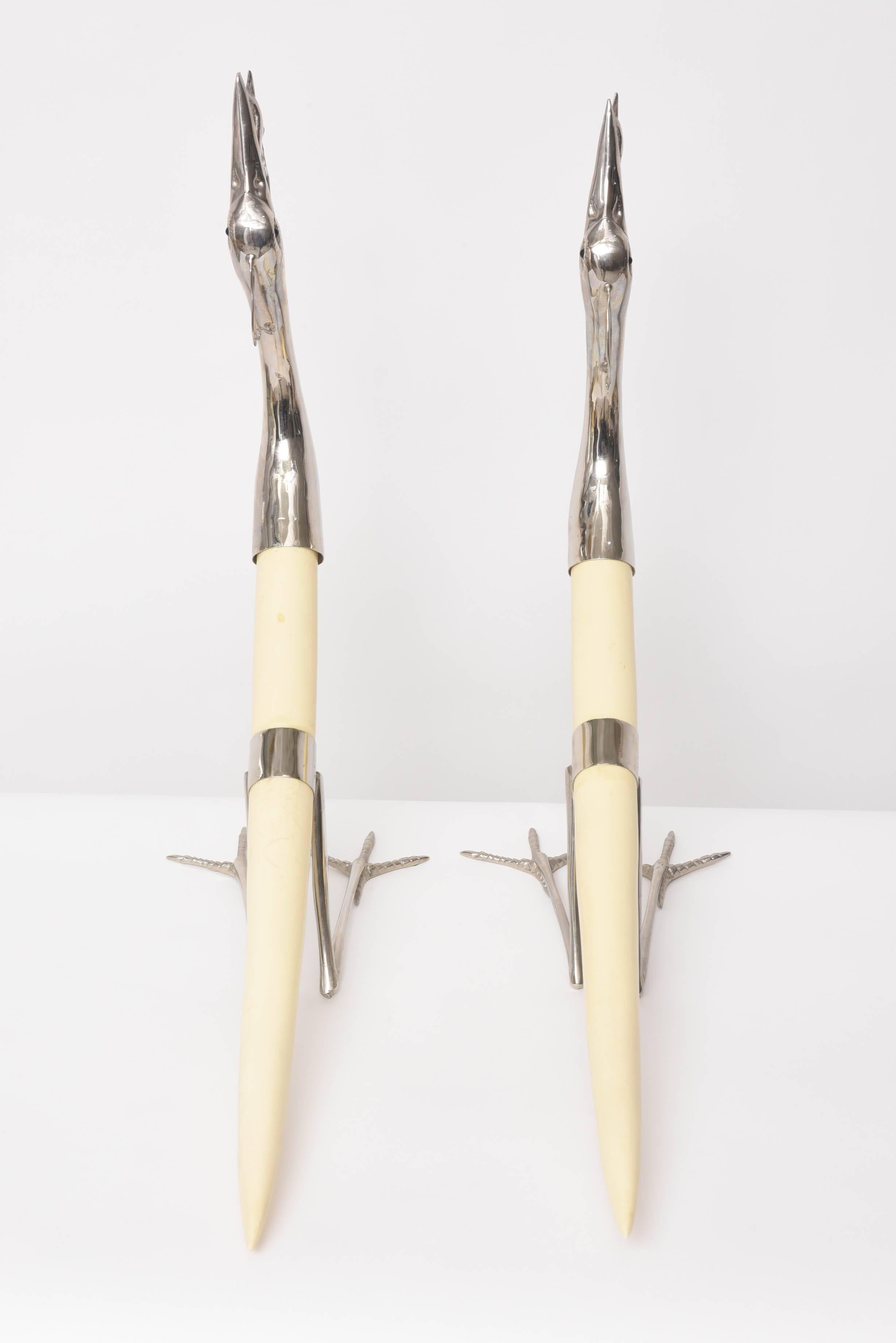 Pair of Hollywood-Regency Silver Plated Stylized Cranes with Fish and Resin Tusk 1