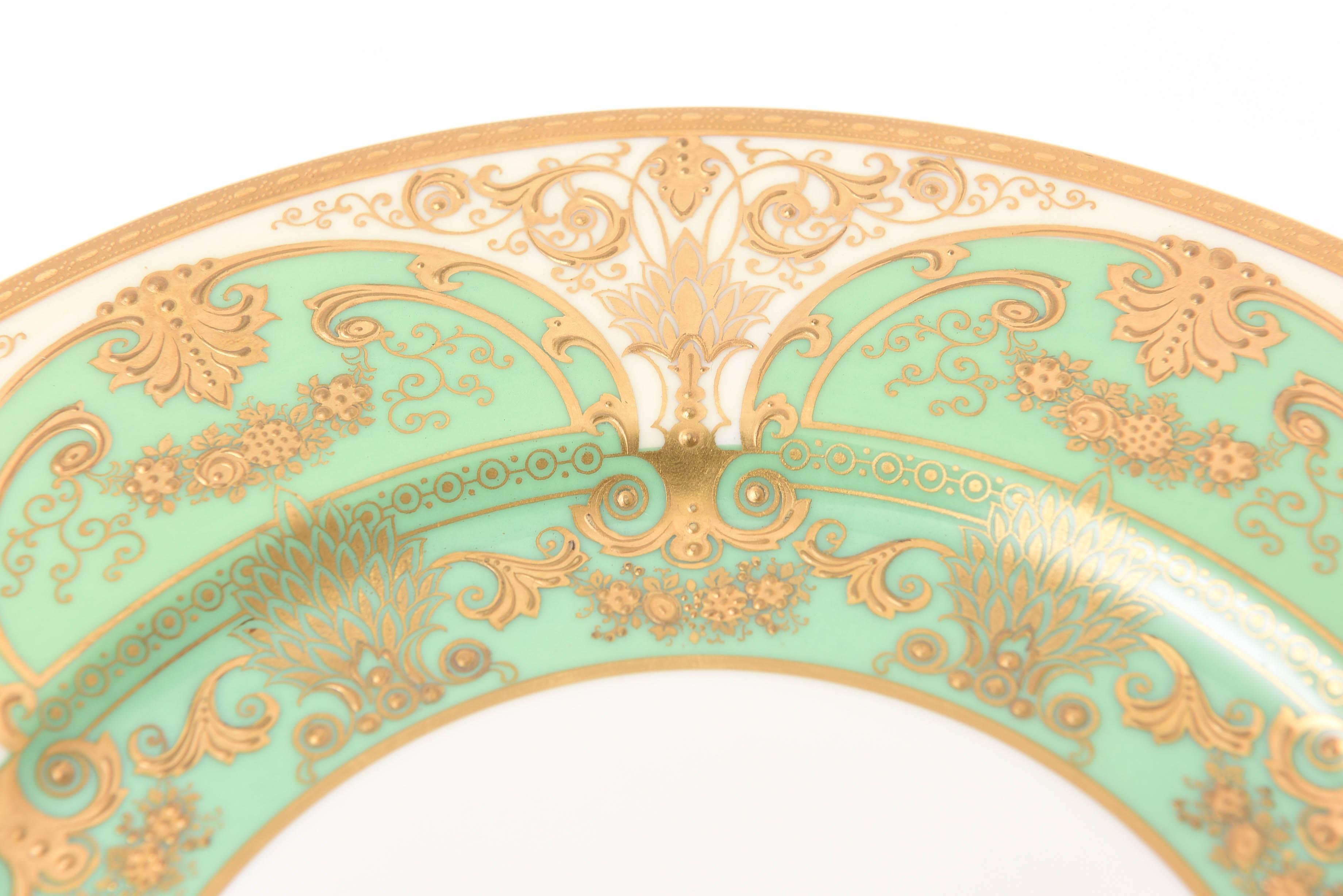 Early 20th Century 12 Elaborate Green and Raised Gold Encrusted Presentation or Dinner Plates