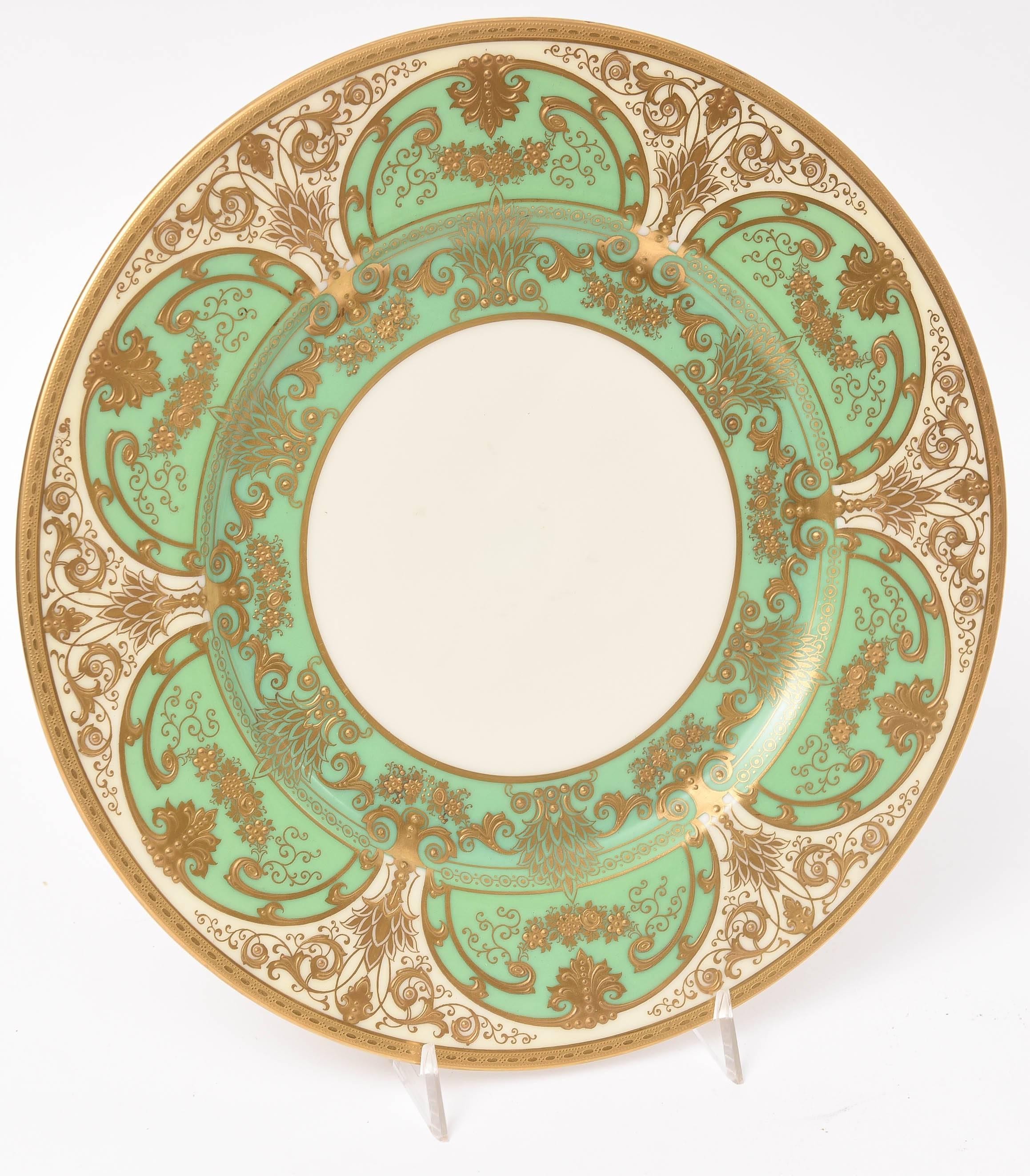Porcelain 12 Elaborate Green and Raised Gold Encrusted Presentation or Dinner Plates