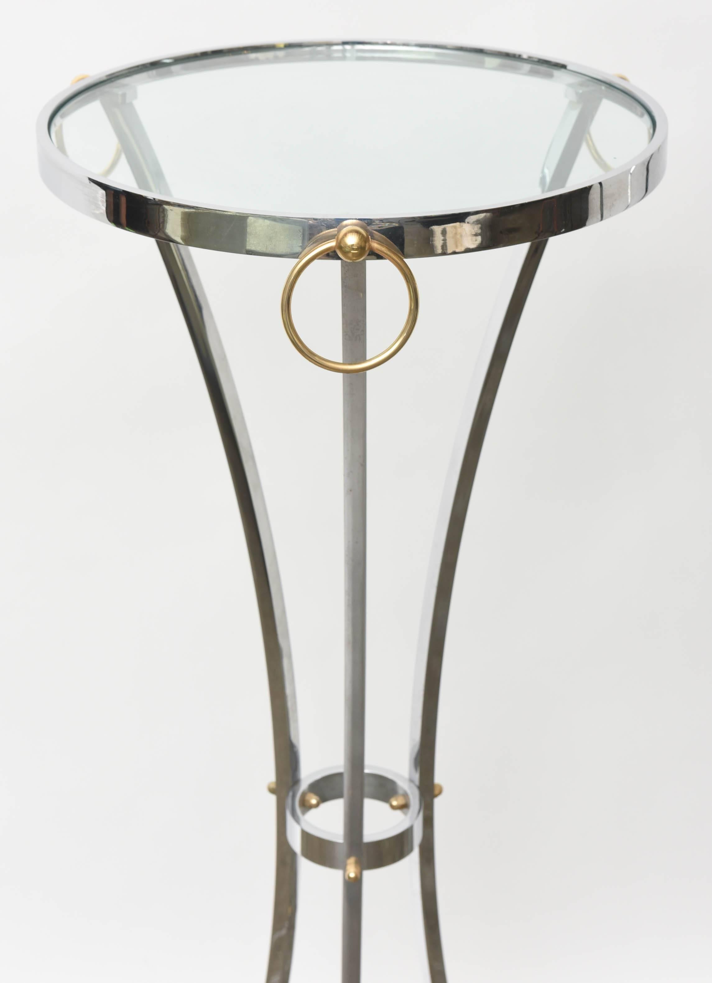 Elegant pair of chrome and brass neo classical pedestals by Maison Jansen.