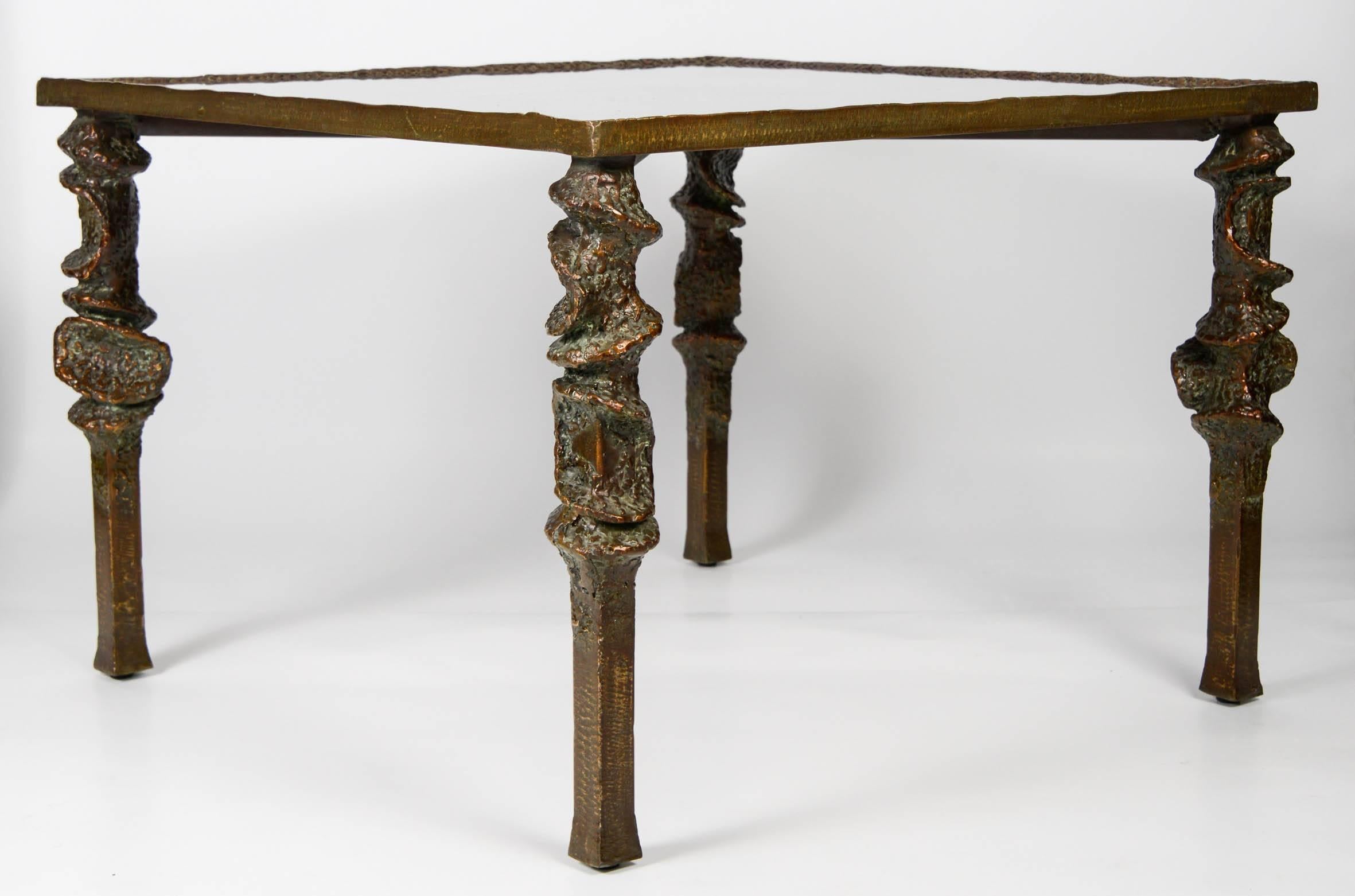 Beautiful low table, patinated metal and glass.