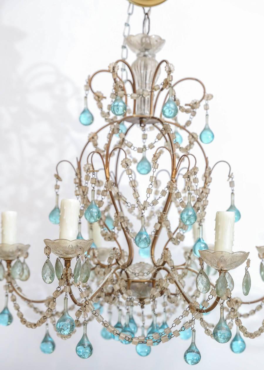 This precious petite Italian crystal chandelier features blue Murano glass drops, this fixture would be perfect in a powder bath or child's room, the options are endless.