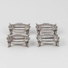 Set of Four Arts & Crafts Silver Dishes