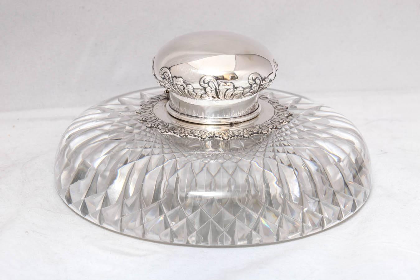 Beautiful, very large, Victorian, sterling silver-mounted crystal inkwell with hinged lid, Tiffany & Company, New York, circa 1895. Crystal is uncut except for the underside, which is cut in a diamond pattern. The diamond cuts are visible through