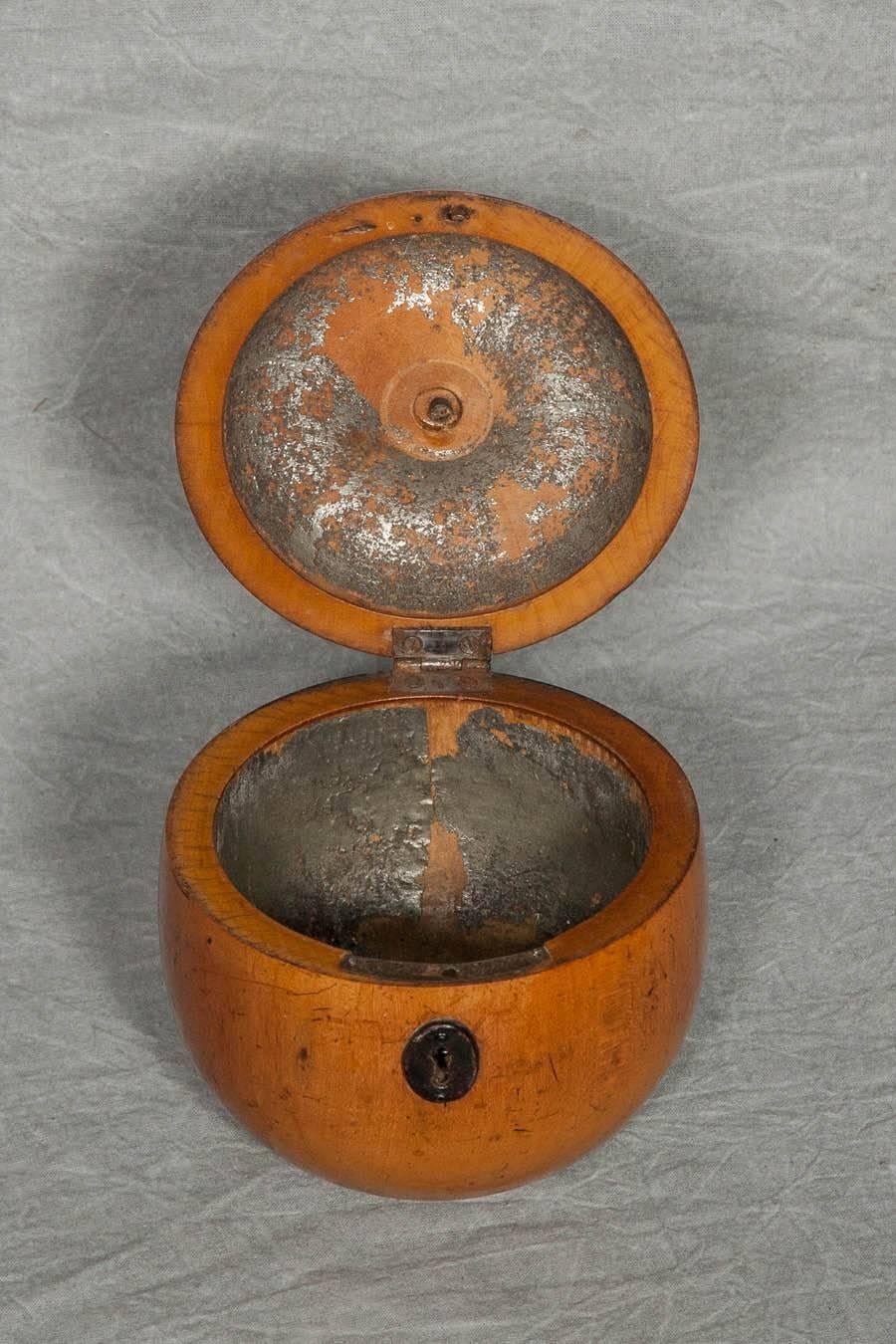 A good example of a late 18th century apple shaped fruitwood tea caddy.