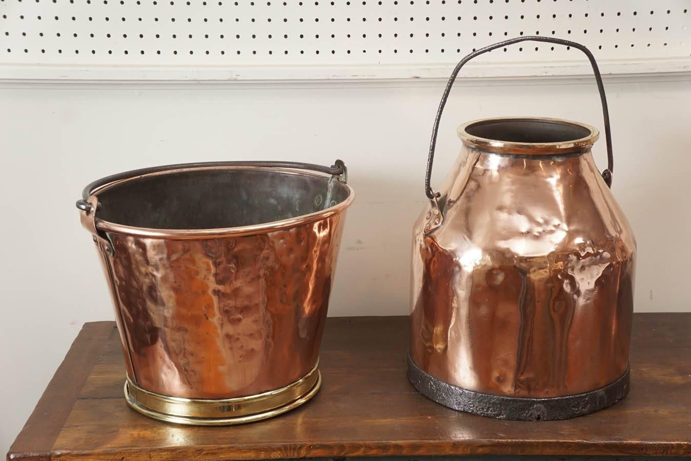 These two pieces are part of a larger collection of copper at painted porch. The milk pail on the right is unique and has great wear and the flower pot on the left with a brass rim on the bottom is stunning. Both are terrific pieces. The milk pail