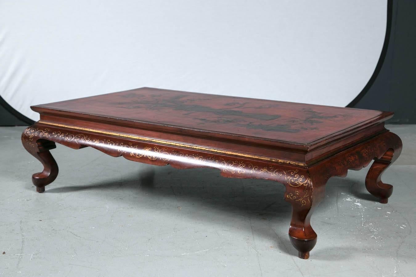 Fabulous red lacquer Chinese coffee table, circa 1950s. Lovely decoration with great style.