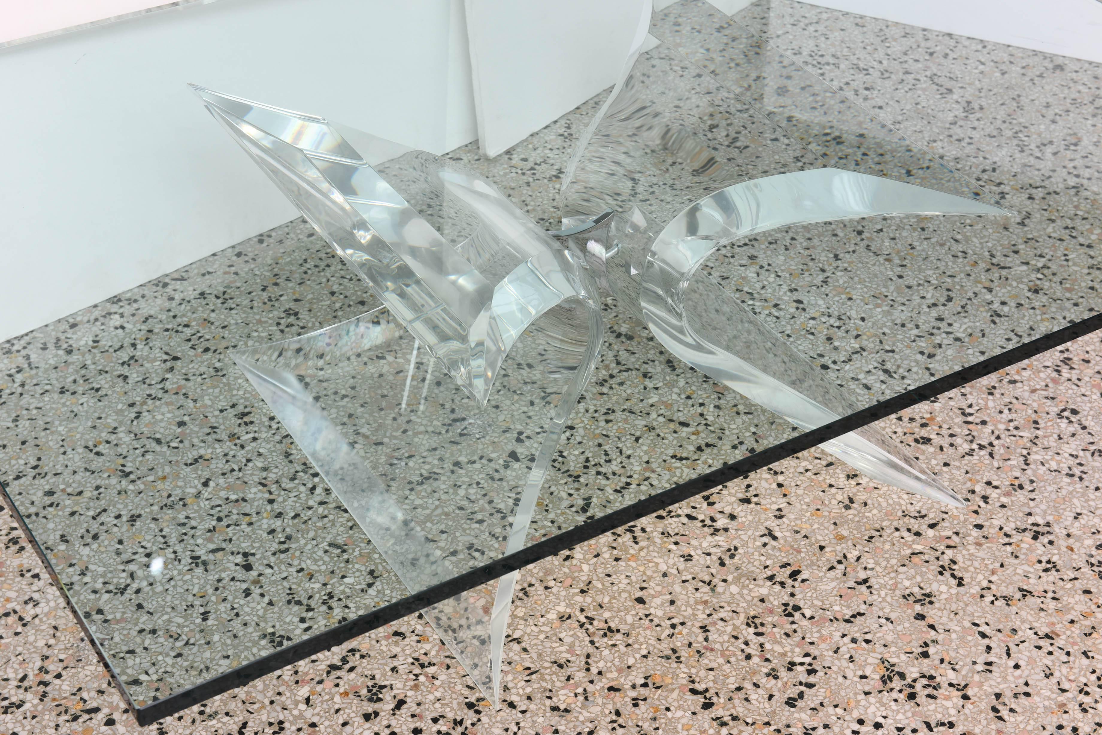 This stylish cocktail table was produced by the iconic firm of Lion in Frost in the 1970s.

The signed Lucite base is the 
