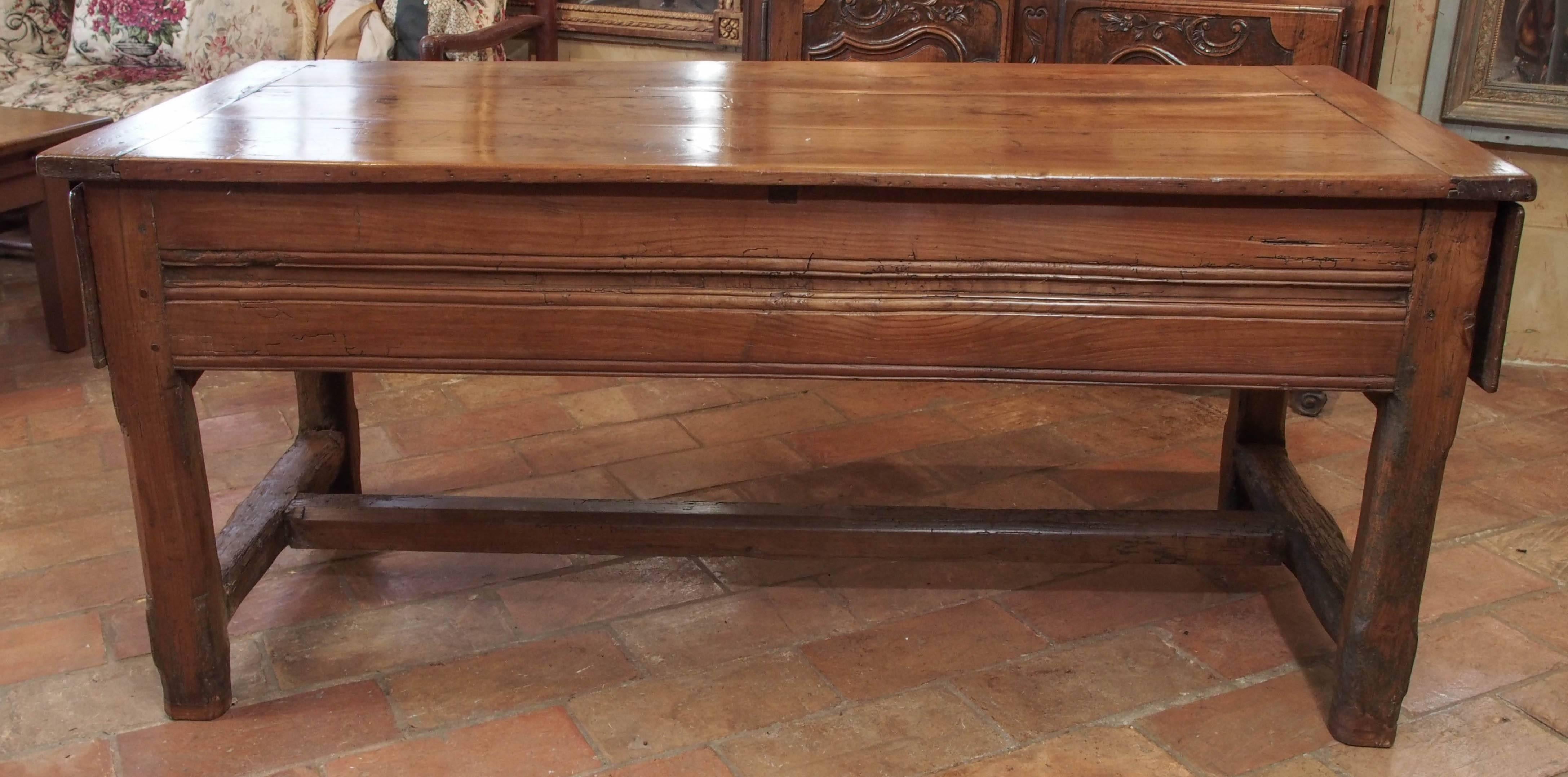 18th century French hand-carved cherry Louis XIV hunt table with rare original drawers at both ends and hand-forged drawer pulls original patina. This table is from the Morvan area located in the Burgandy. This table would be wonderful as a sofa