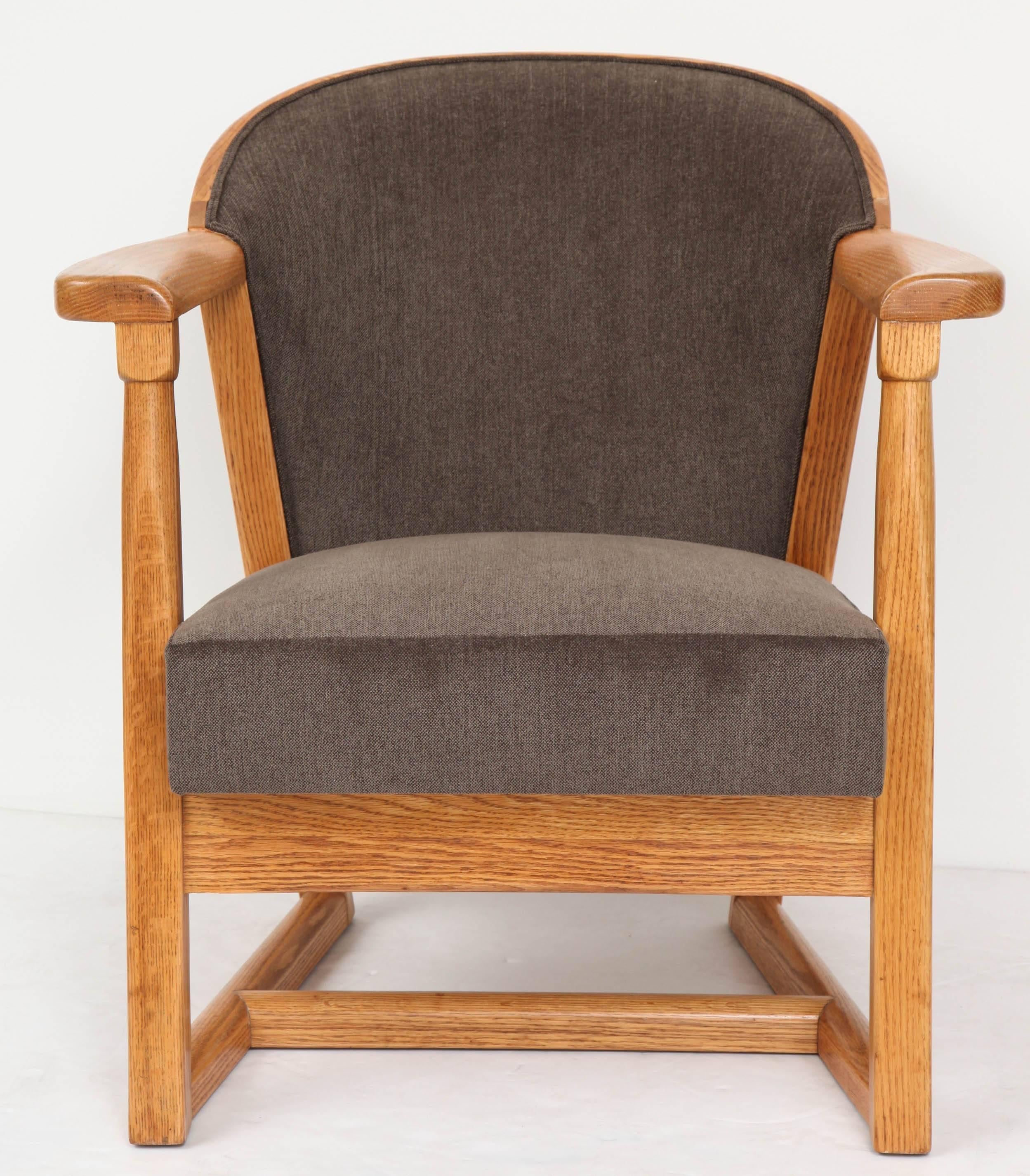 Curvaceous armchair in English oak by Jack van der Molen for Jamestown furniture, 1950s. Newly refinished and reupholstered in Knoll velour.