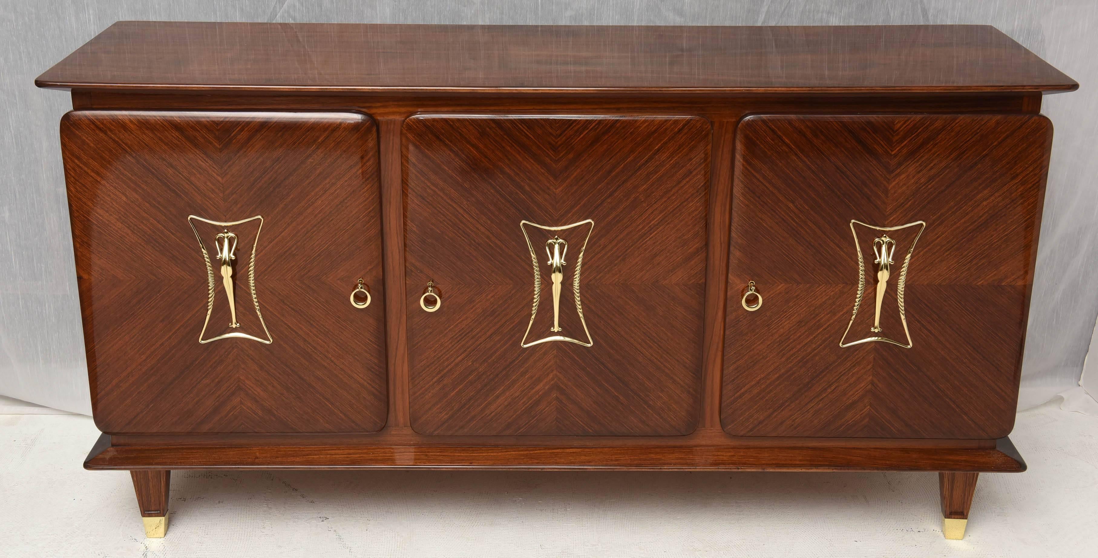 Very elegant Italian  rosewood sideboard, three doors, on each one a 