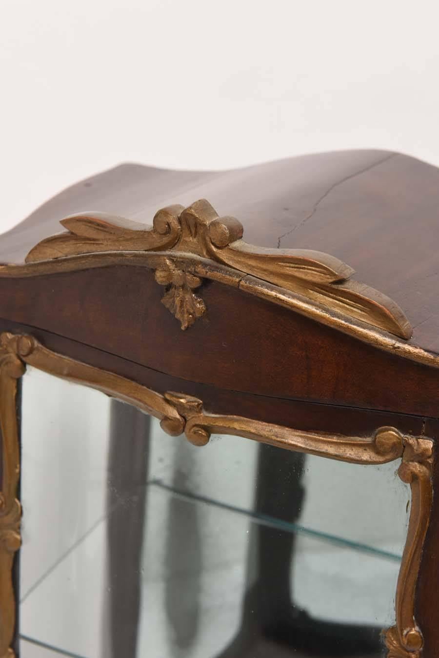 Very sweet miniature French vitrine with glass sides, door and mirrored back.