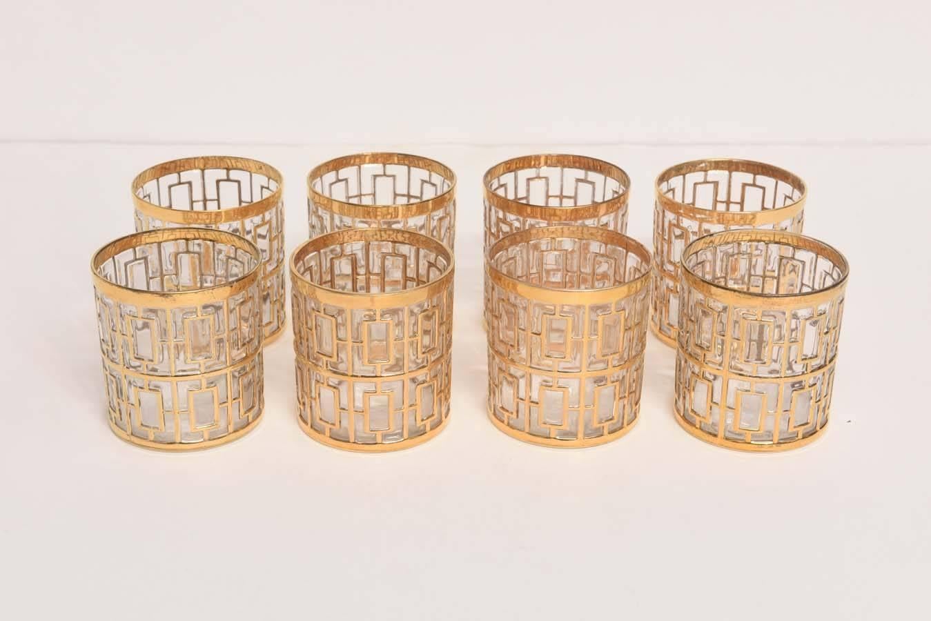 Stylish set of eight rocks/cocktail glasses. They are in the Shoji pattern in twenty four karat gold. Produced by the Imperial Glass Co.
