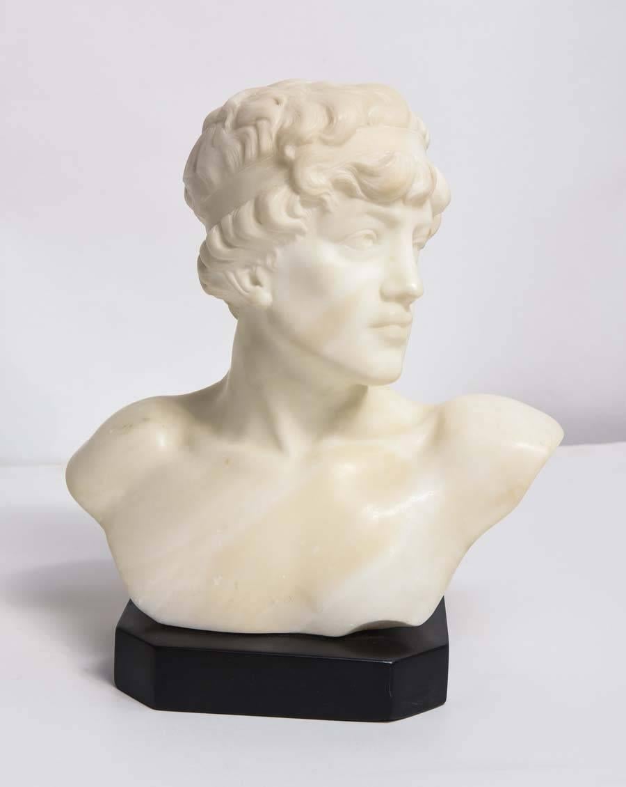 Handsome white marble 19th century bust on black marble base, signed and dated by artist.