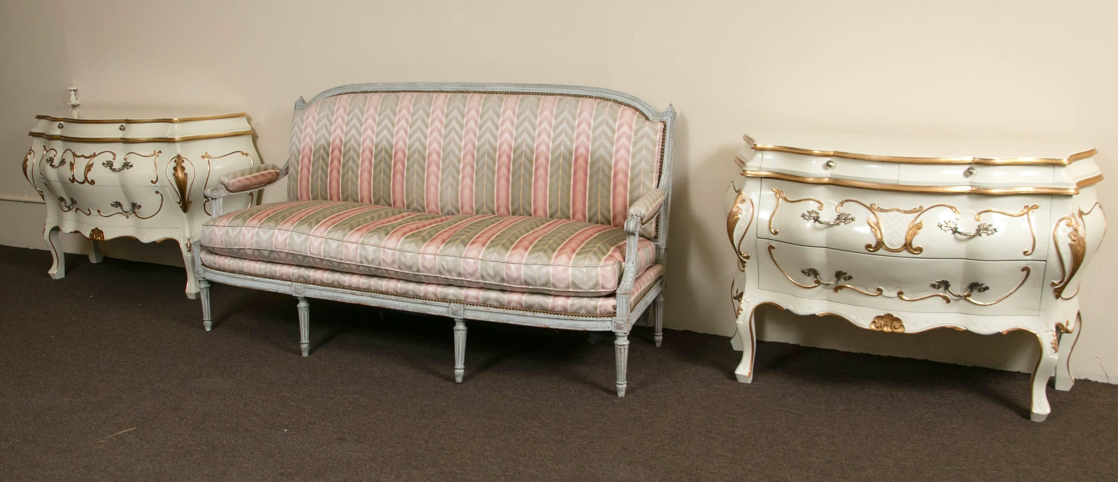 Distressed Paint Decorated Louis XVI Style Settee attrib to Maison Jansen. A wonderfully detailed sofa by one of the most sought after designers. The distressed off white paint decorated frame  supported by four front and two rear legs. In a fine
