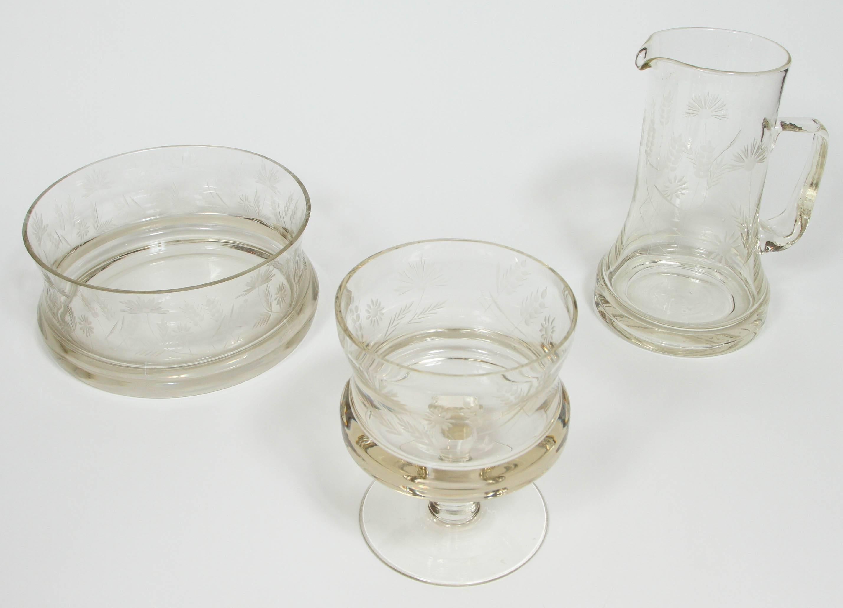 Set of 3 Victorian glass serving pieces with etched thistle pattern. Includes bowl, footed compote, and pitcher.