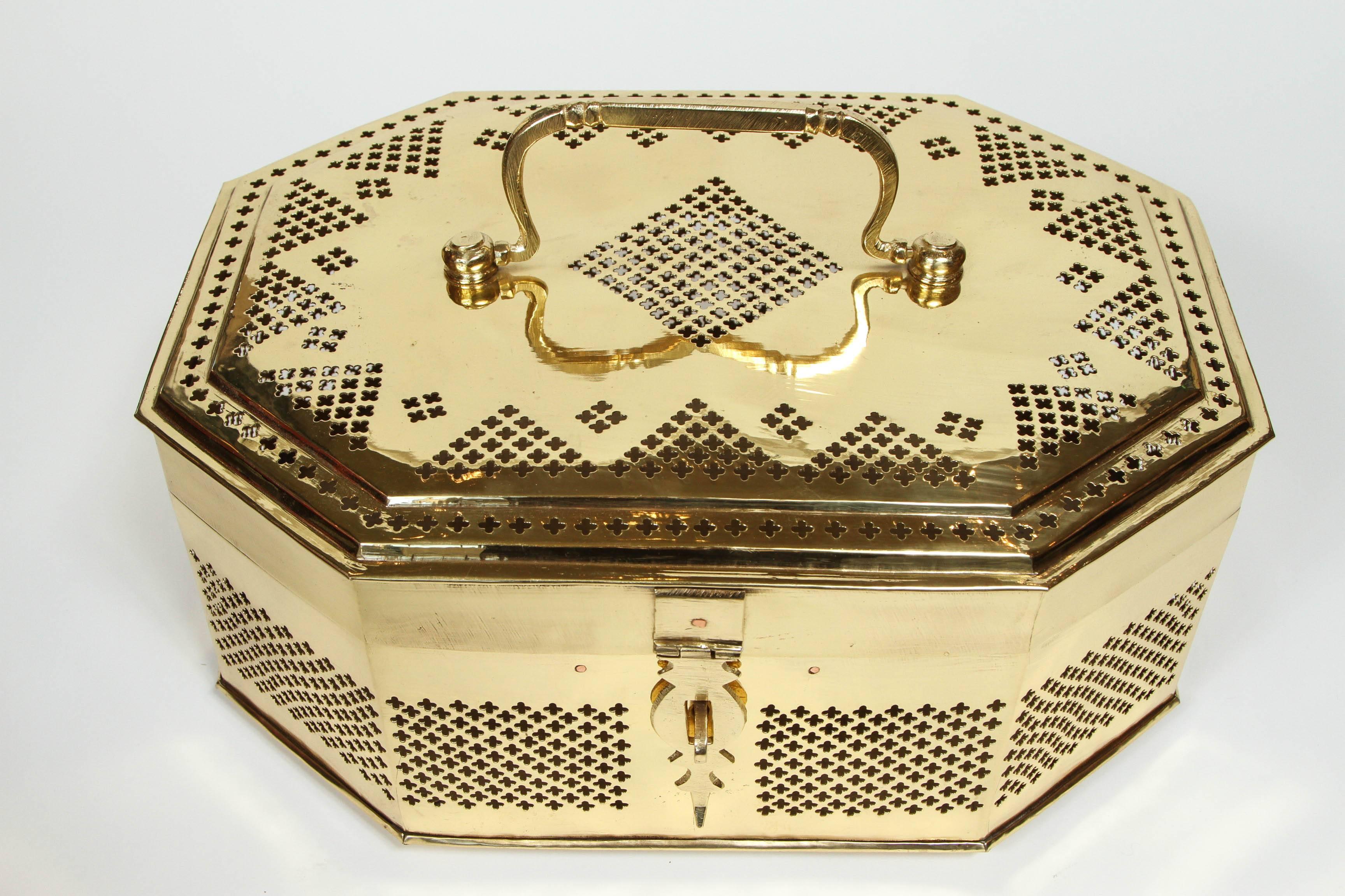 Large brass cricket box that has been newly polished.